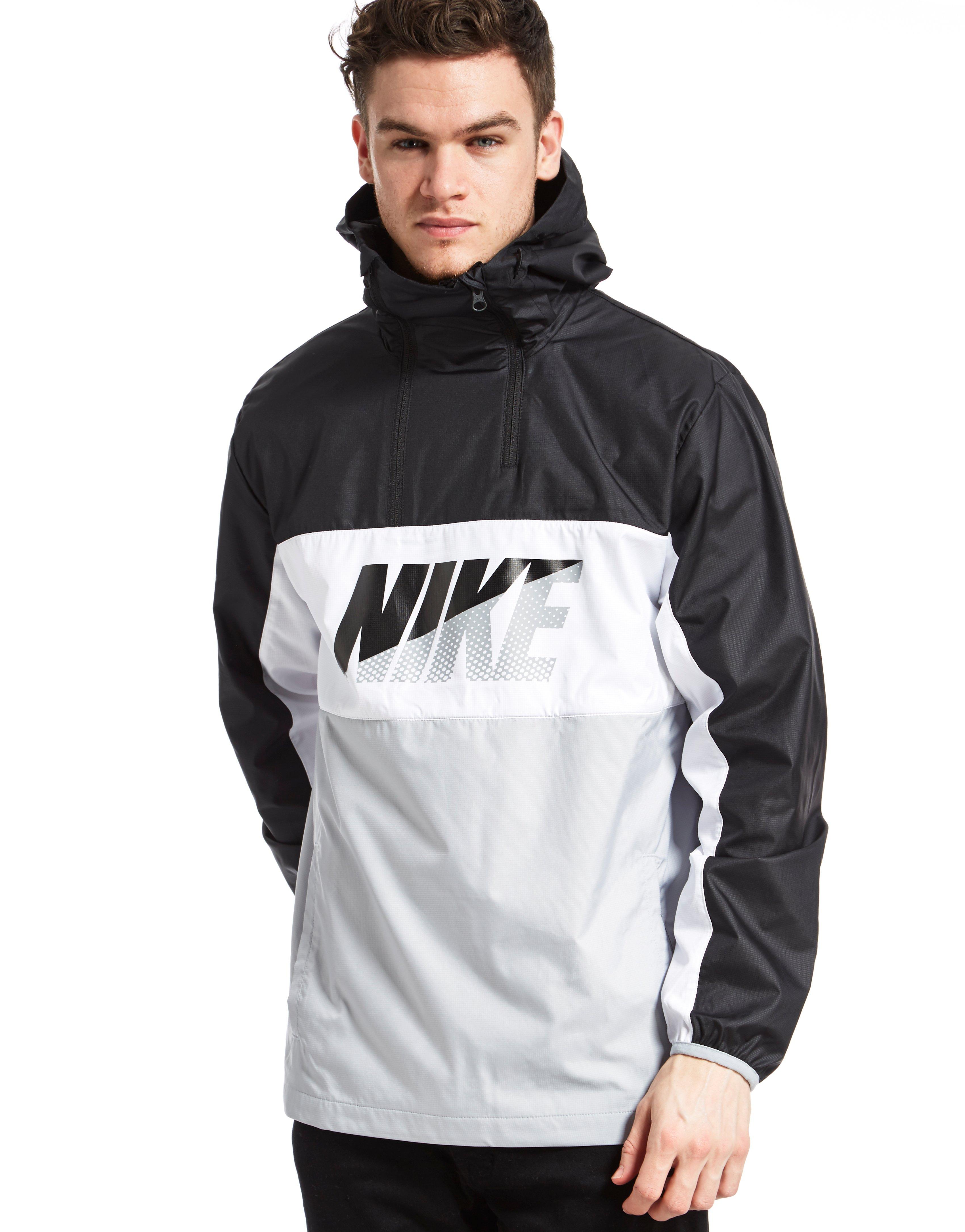 white nike half zip jacket