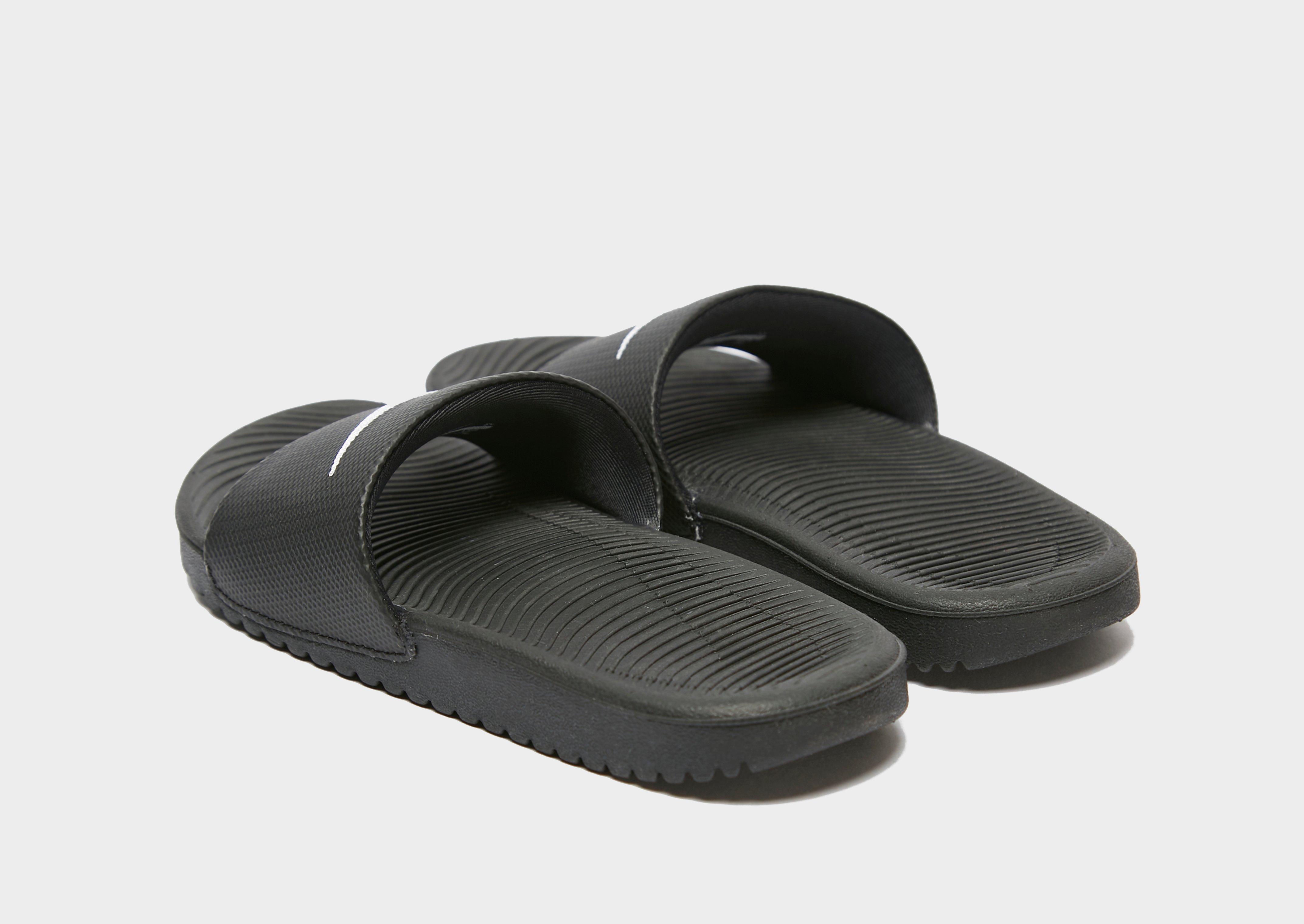 Gyerek papucsok és flip-flopok NIKE KAWA SLIDES  819352-001 Fekete