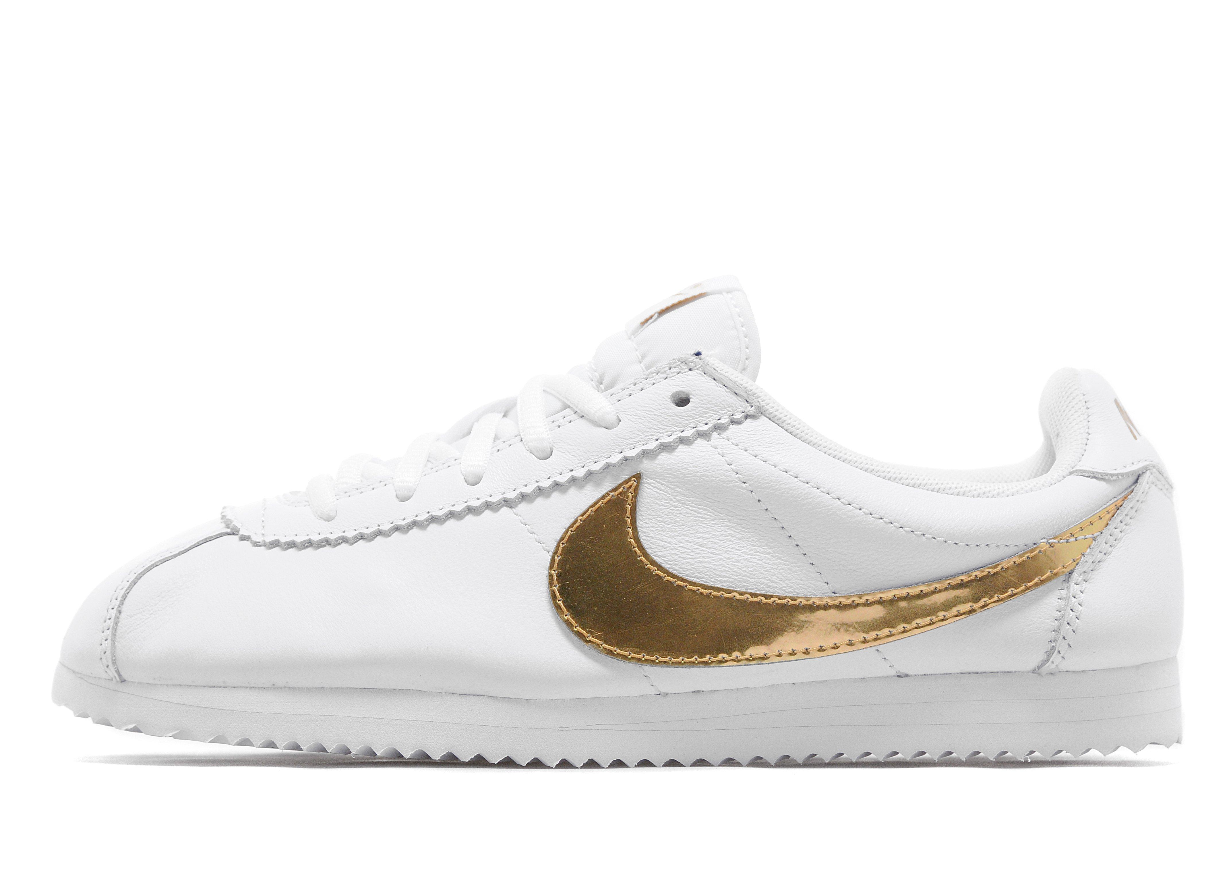 white nike cortez junior