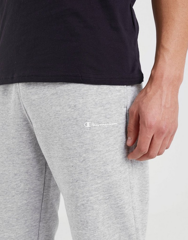 Pánske nohavice CHAMPION NOHAVICE  ELASTIC CUFF PANTS 218702EM021 Sivá