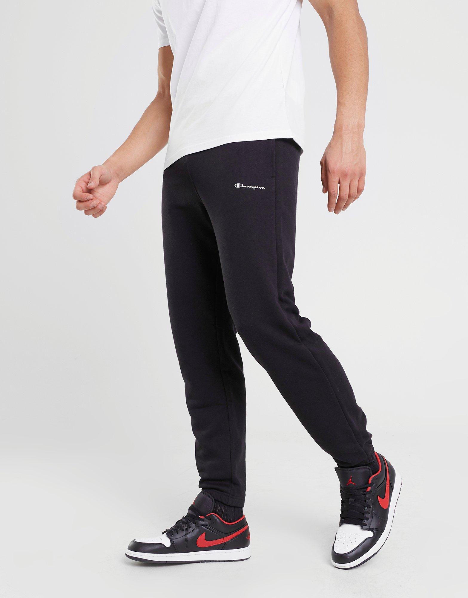 Pánské kalhoty CHAMPION KALHOTY  ELASTIC CUFF PANTS 218702KK001 Černá