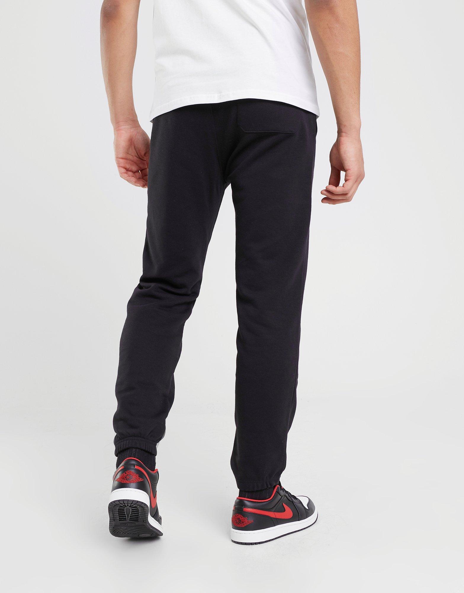 Pánské kalhoty CHAMPION KALHOTY  ELASTIC CUFF PANTS 218702KK001 Černá