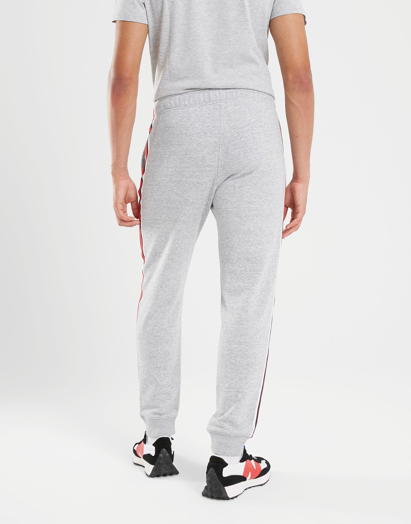 Pánske nohavice CHAMPION NOHAVICE  RIB CUFF PANTS 218767EM021 Sivá