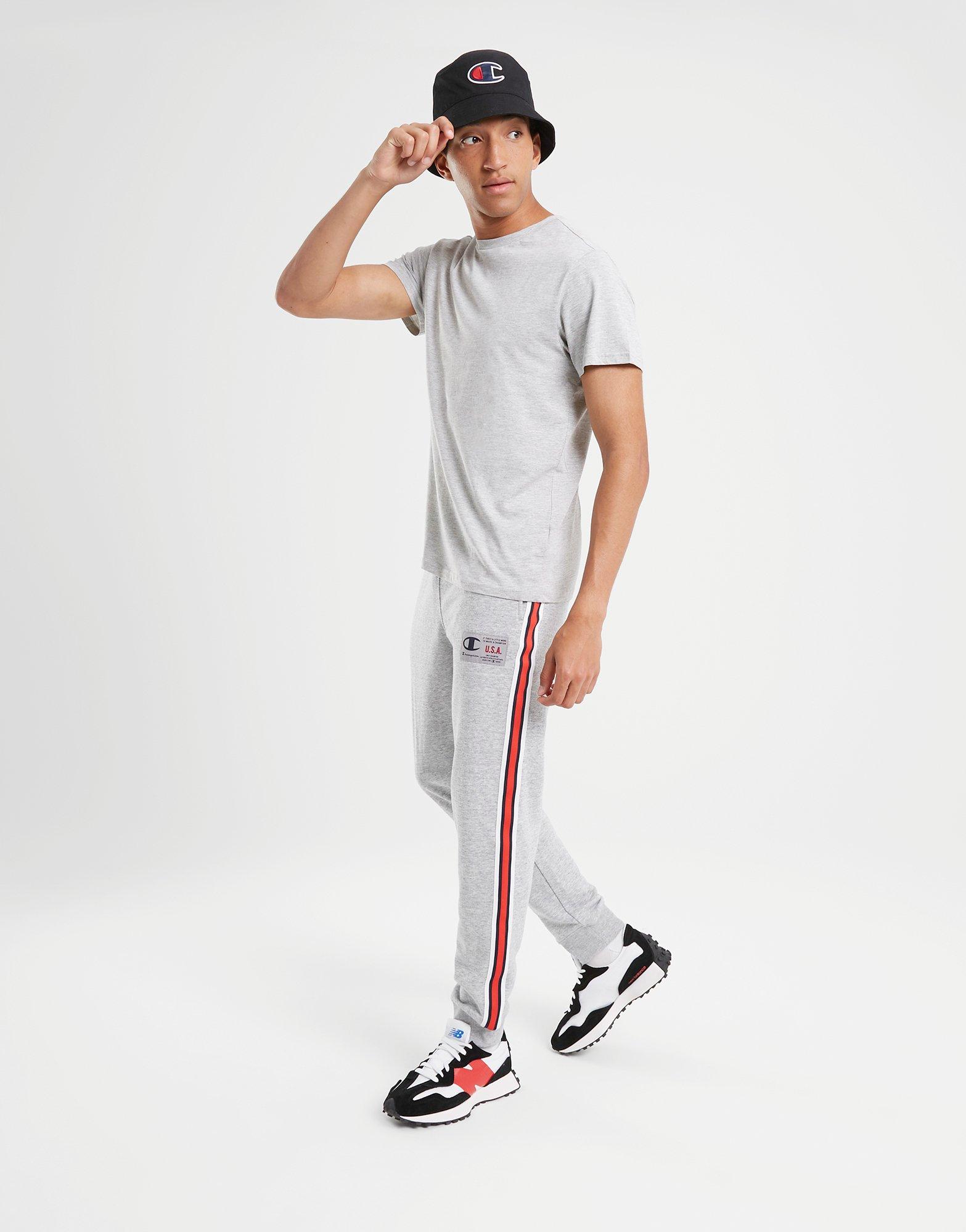 Pánske nohavice CHAMPION NOHAVICE  RIB CUFF PANTS 218767EM021 Sivá