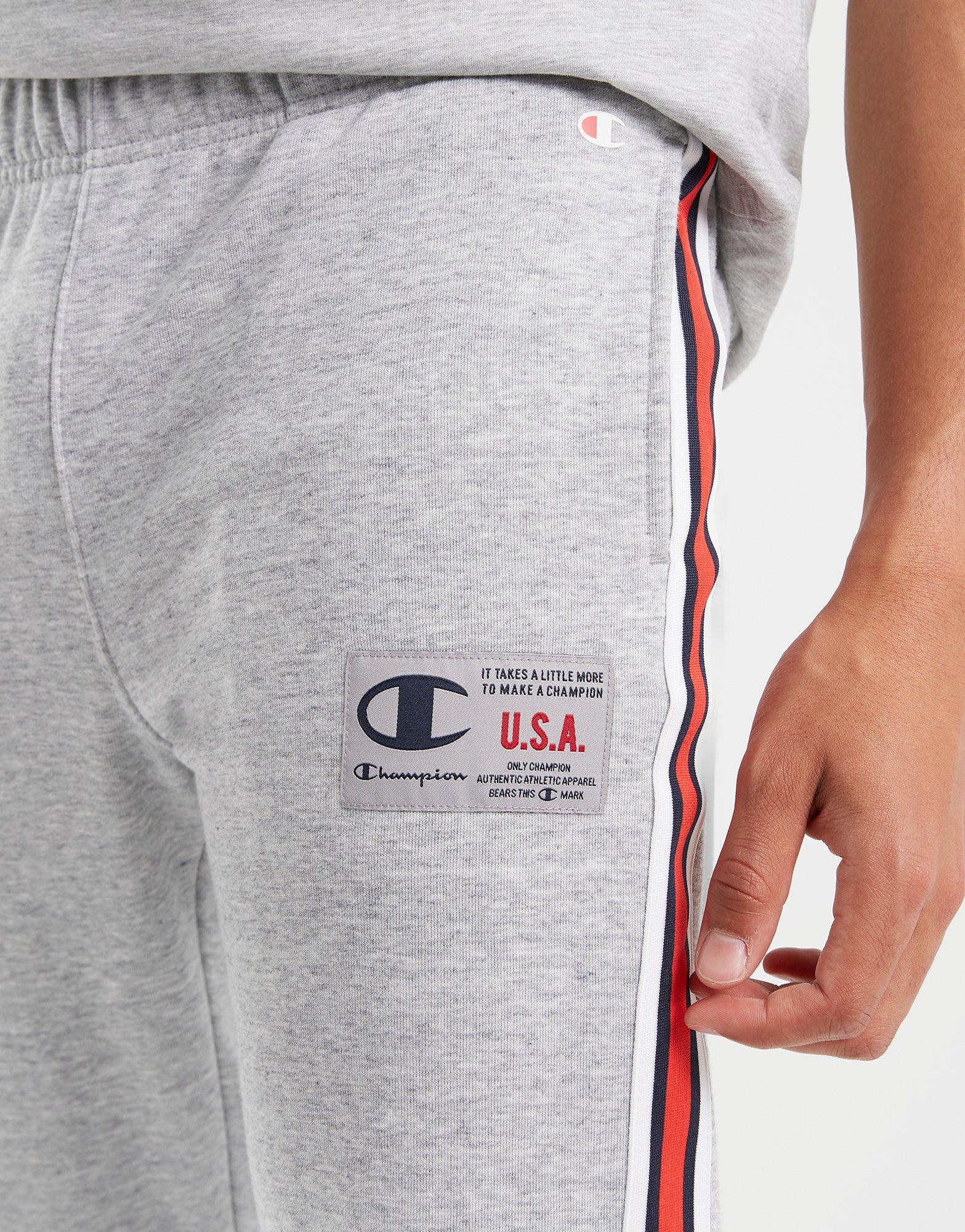 Pánske nohavice CHAMPION NOHAVICE  RIB CUFF PANTS 218767EM021 Sivá