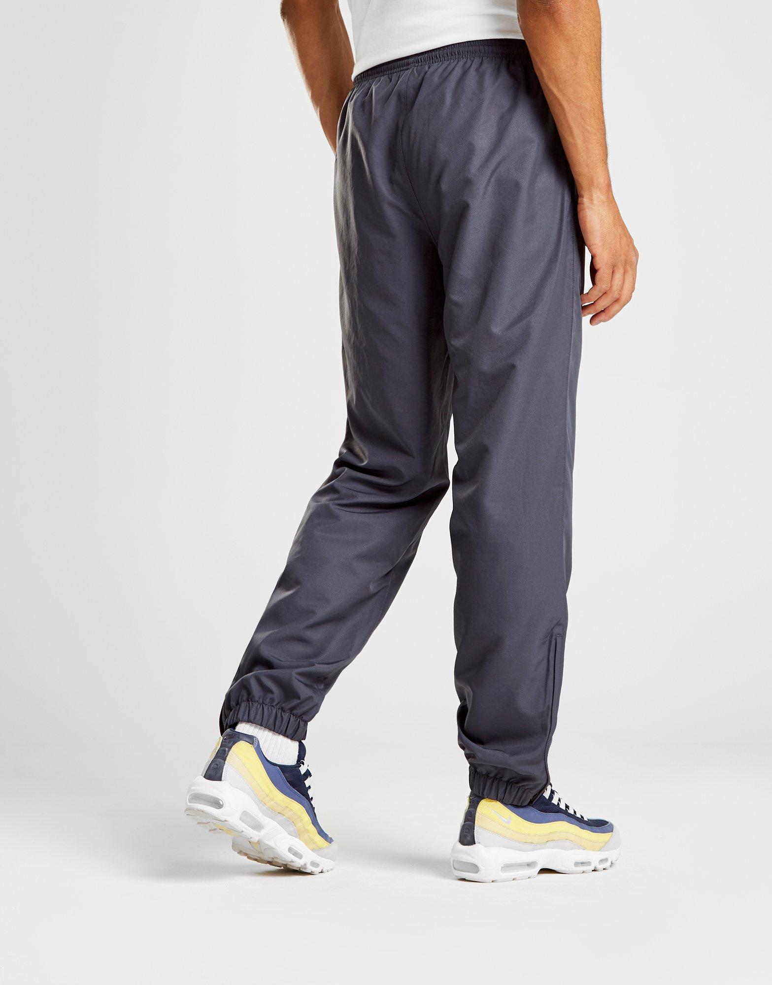 grey lacoste guppy track pants