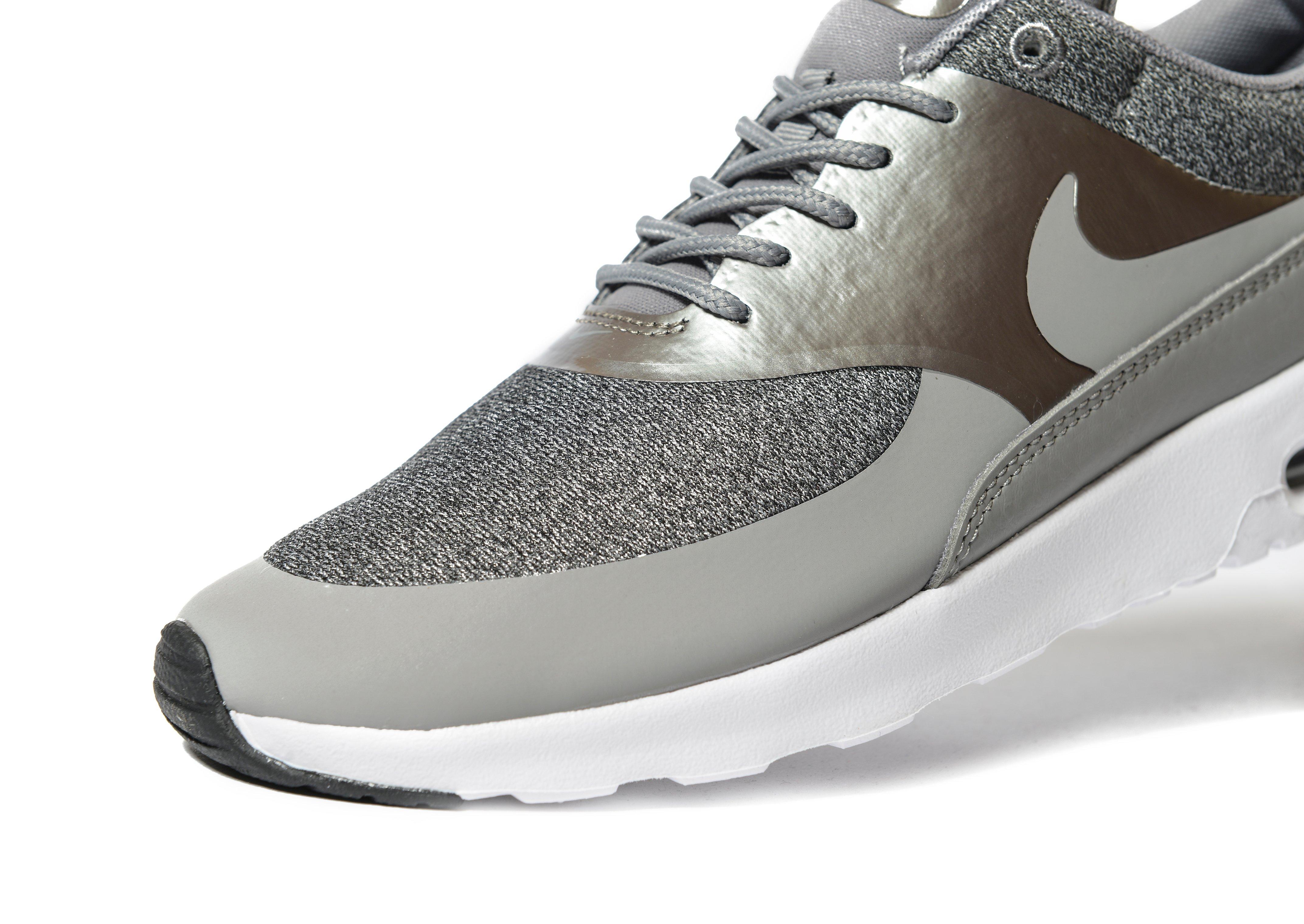 jd sports nike thea
