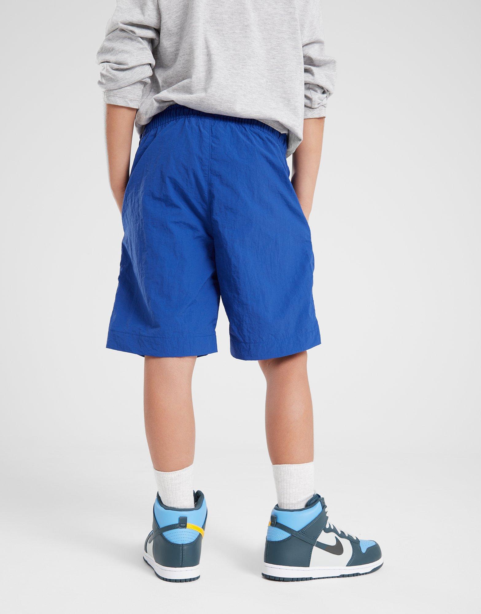 Pantaloni scurți pentru copii CHAMPION PANTALONI SCURȚI BEACHSHORT B 306771BS003 Albastru