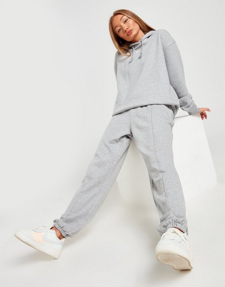 Pantaloni pentru femei NIKE PANTALONI  SPORTSWEAR ESSENTIAL FLEECE BV4089-063 Gri