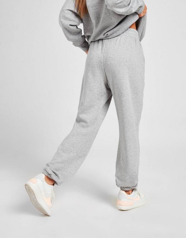 Pantaloni pentru femei NIKE PANTALONI  SPORTSWEAR ESSENTIAL FLEECE BV4089-063 Gri