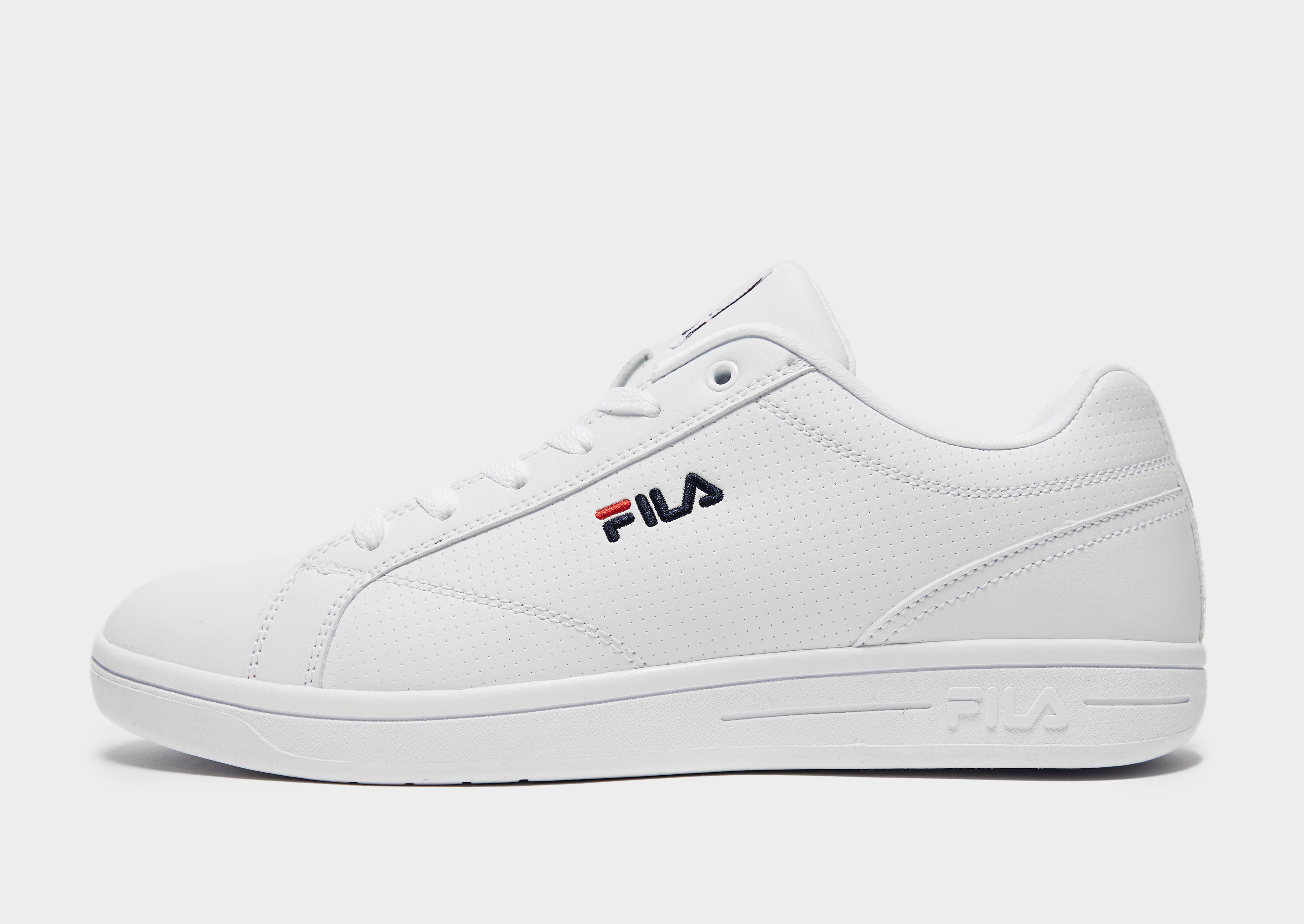 white and grey fila trainers