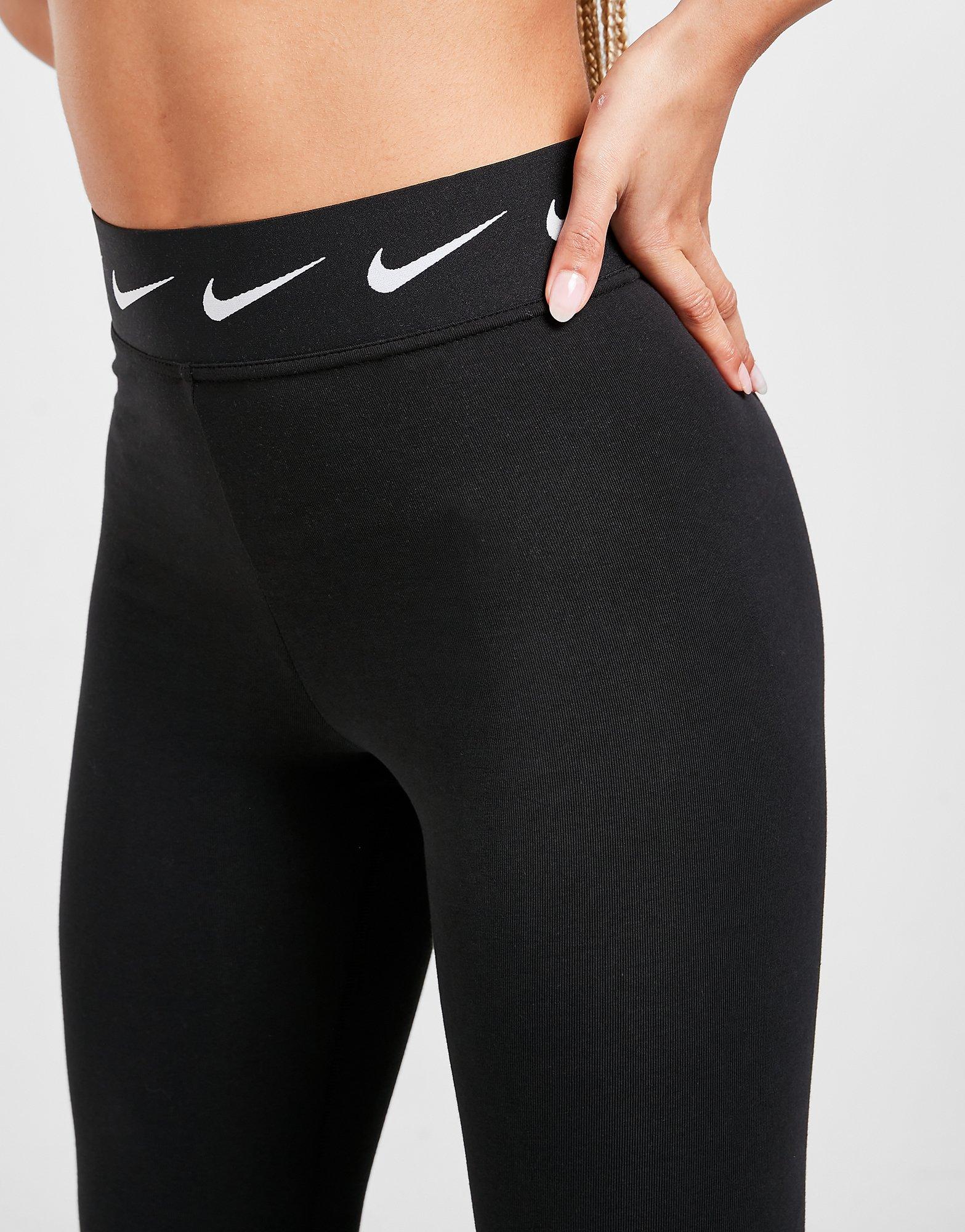 Legginsy damskie NIKE LEGGINGS HIGH WAISTED SINGLE SWOOSH LEGGINGS DH5014010 Czarny