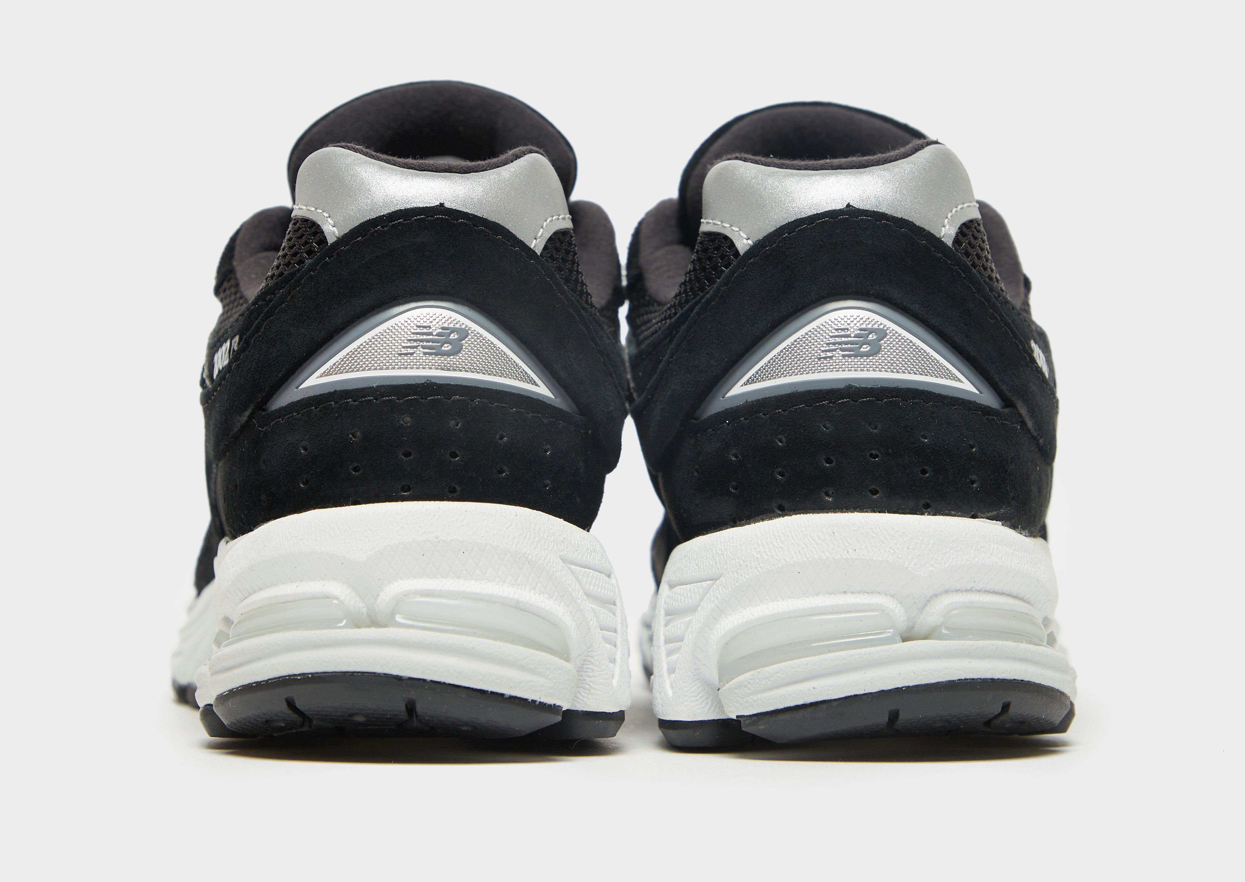 Kedai moterims NEW BALANCE 2002R  M2002RJB Juoda