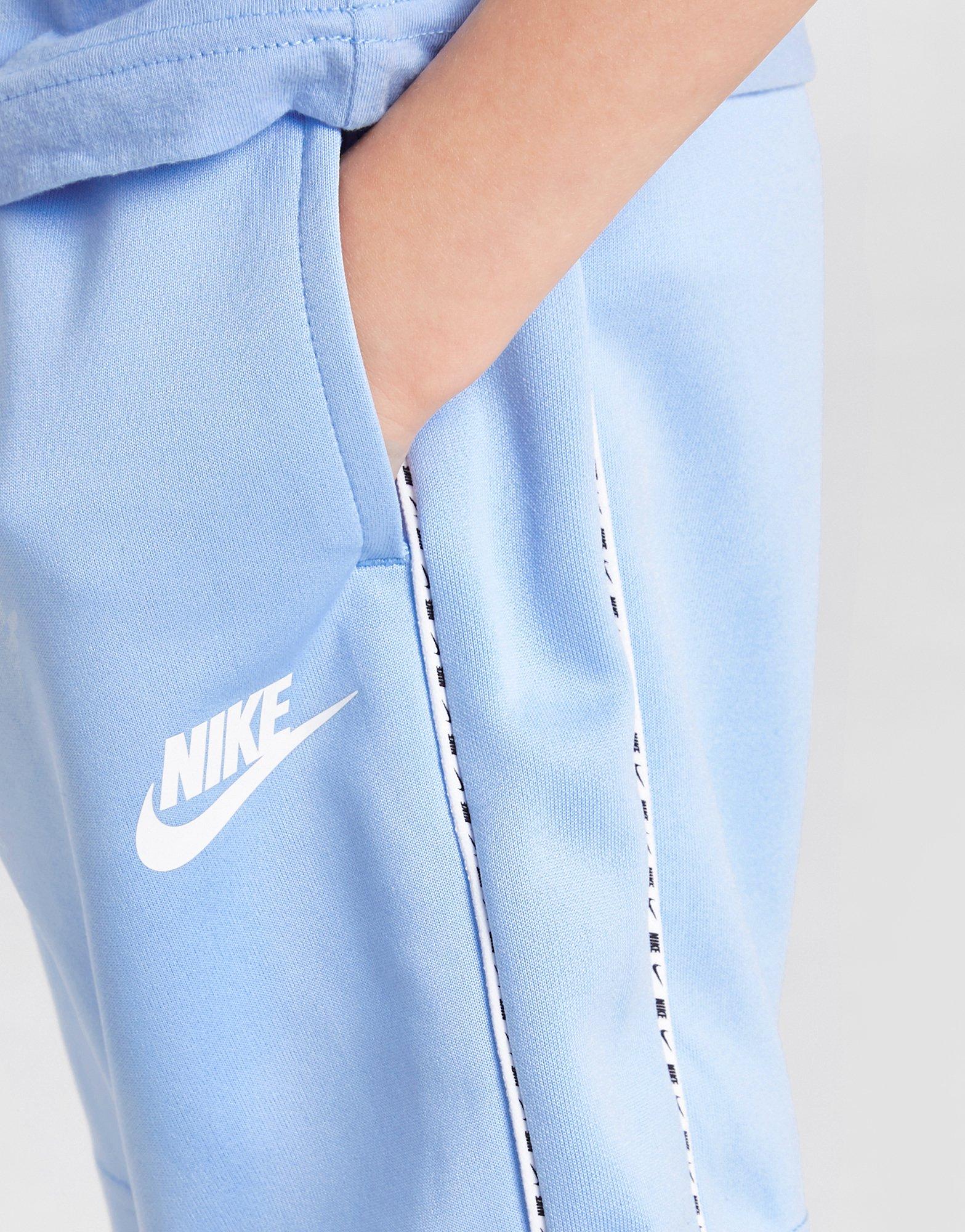 Detské tričko NIKE TRIČKO SWOOSH TAPE TRIČKO/SHORTS SET CHI 86I046C60 Modrá