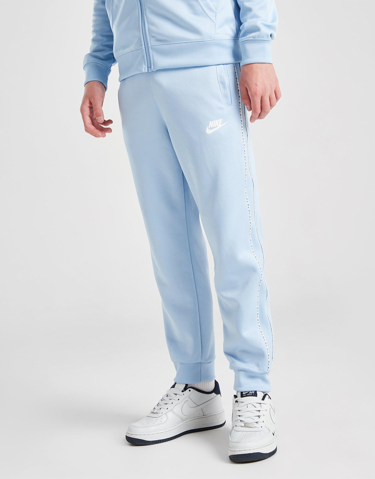 Дитячі штани NIKE ШТАНИ TAPE PANTS BLU DD4008-436 Блакитний
