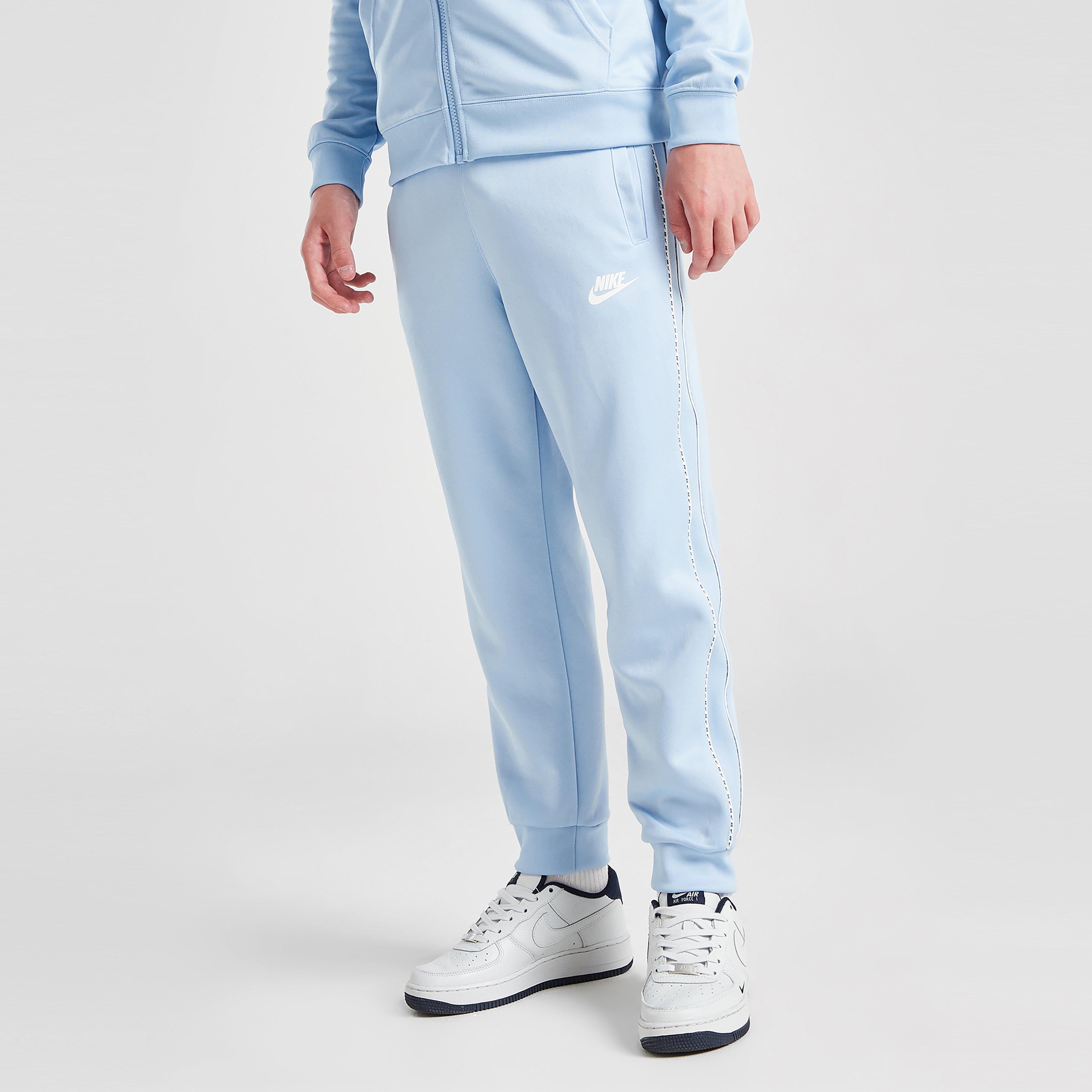 Pantaloni pentru copii NIKE PANTALONI  TAPE PANTS BLU