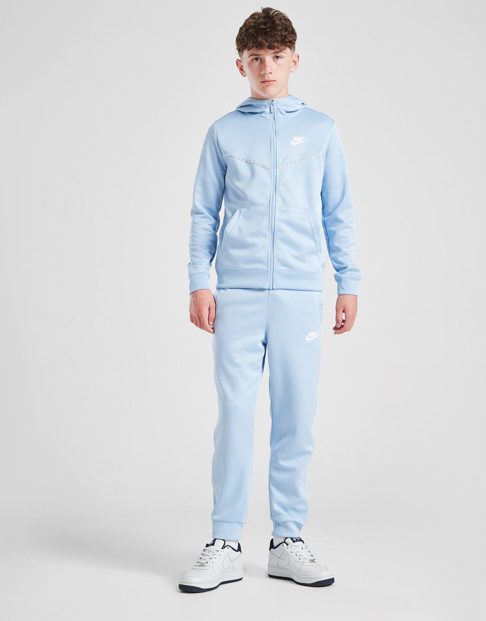 Дитячі штани NIKE ШТАНИ TAPE PANTS BLU DD4008-436 Блакитний