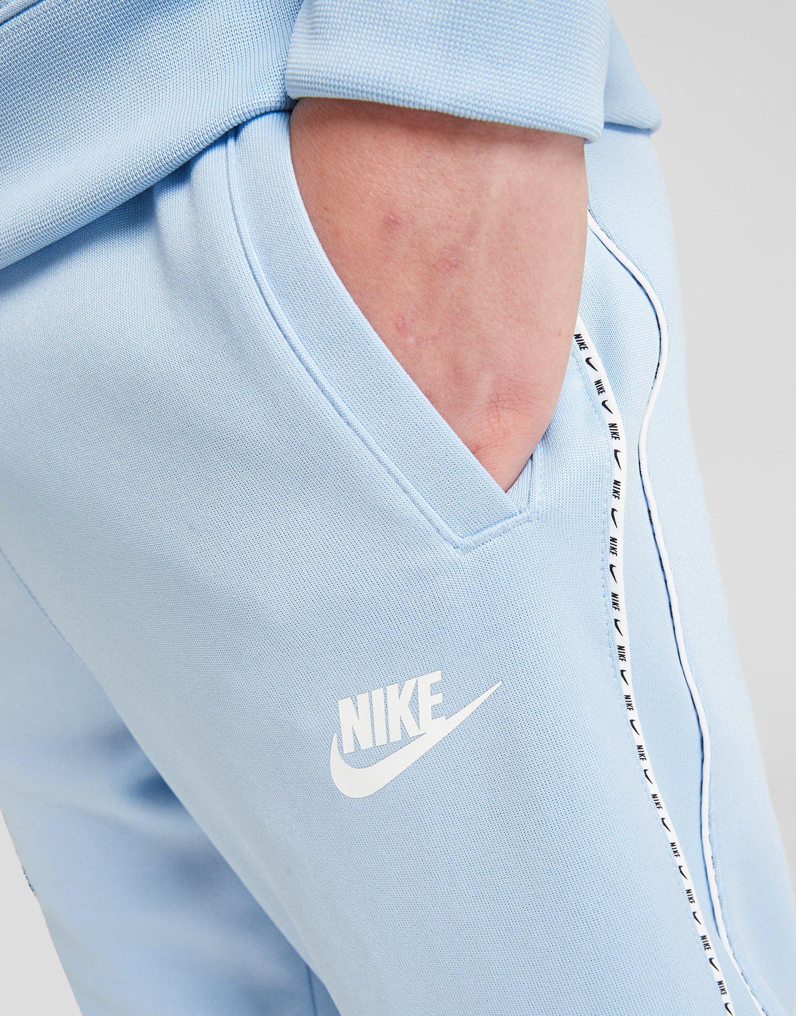 Дитячі штани NIKE ШТАНИ TAPE PANTS BLU DD4008-436 Блакитний