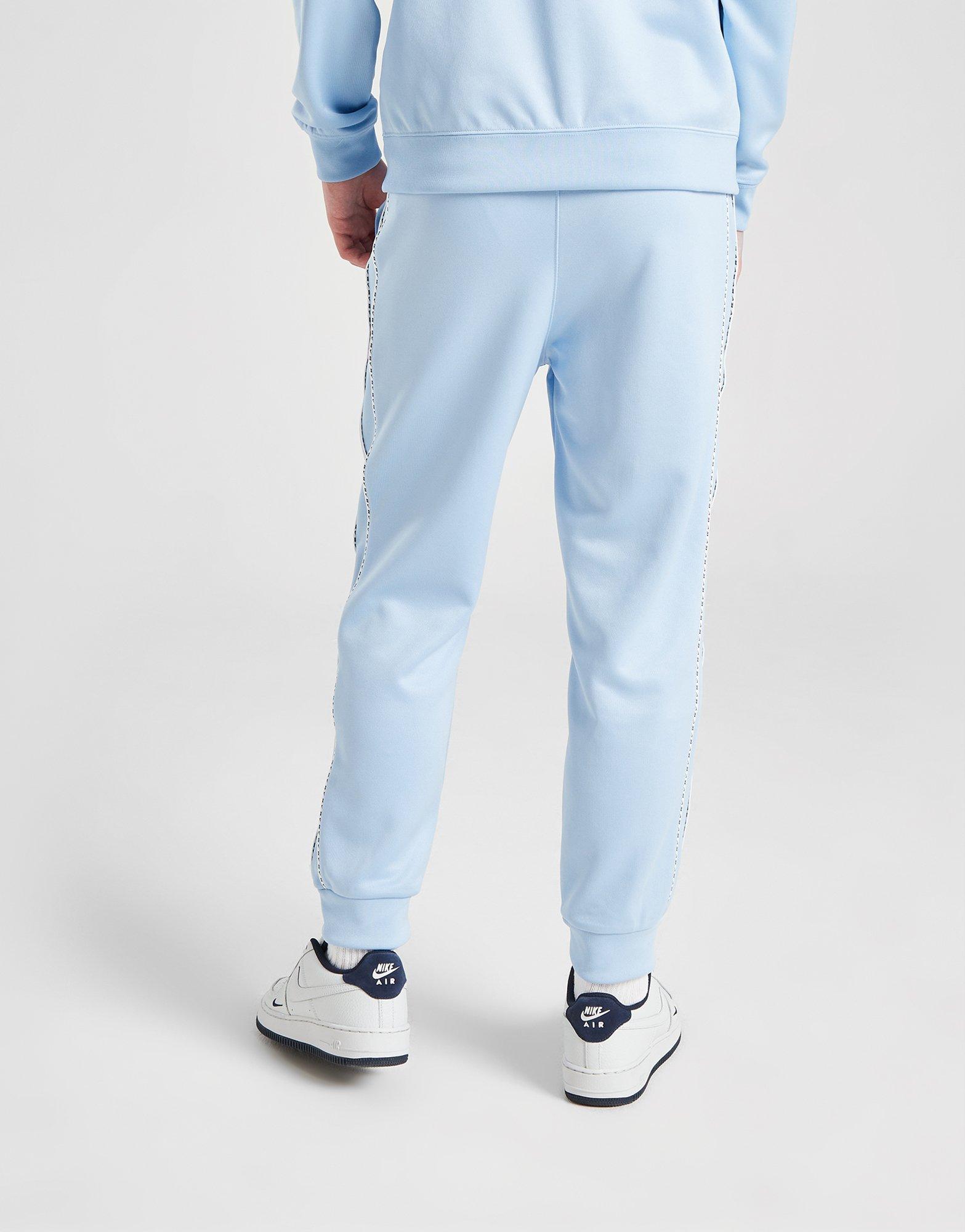 Дитячі штани NIKE ШТАНИ TAPE PANTS BLU DD4008-436 Блакитний