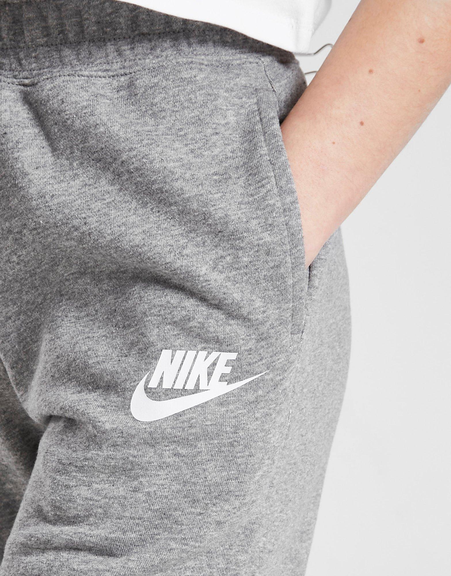 NIKE SET GIRLS' CLUB FRENCH TERRY JOGGERS JUNIOR DC7211091 Szary