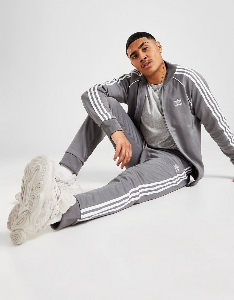 Pánske nohavice ADIDAS NOHAVICE  SS TRACK PANTS HB5900 Sivá