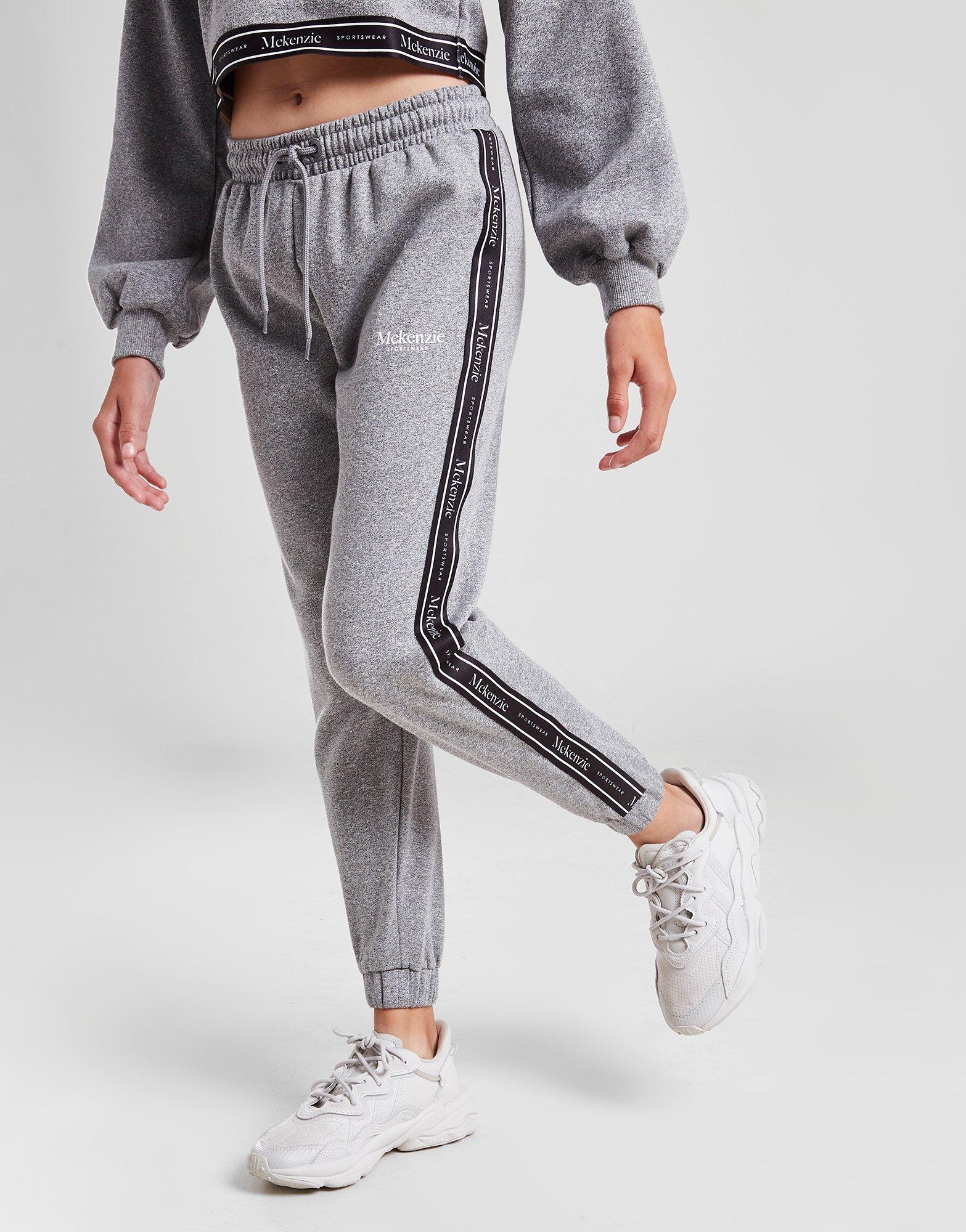 MCKENZIE SPODNIE GIRLS' MAYA TAPE JOGGERS JUNIOR MCKTJ14552GRY Szary