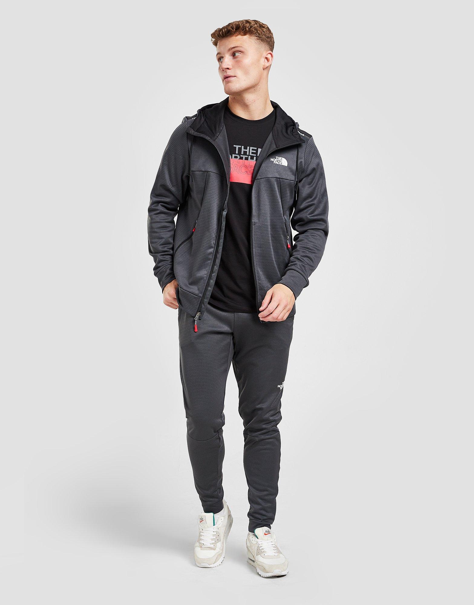 Bluza męska THE NORTH FACE BLUZA Z KAPTUREM TRAIN N LOGO FULL NF0A5IK10C51 Szary