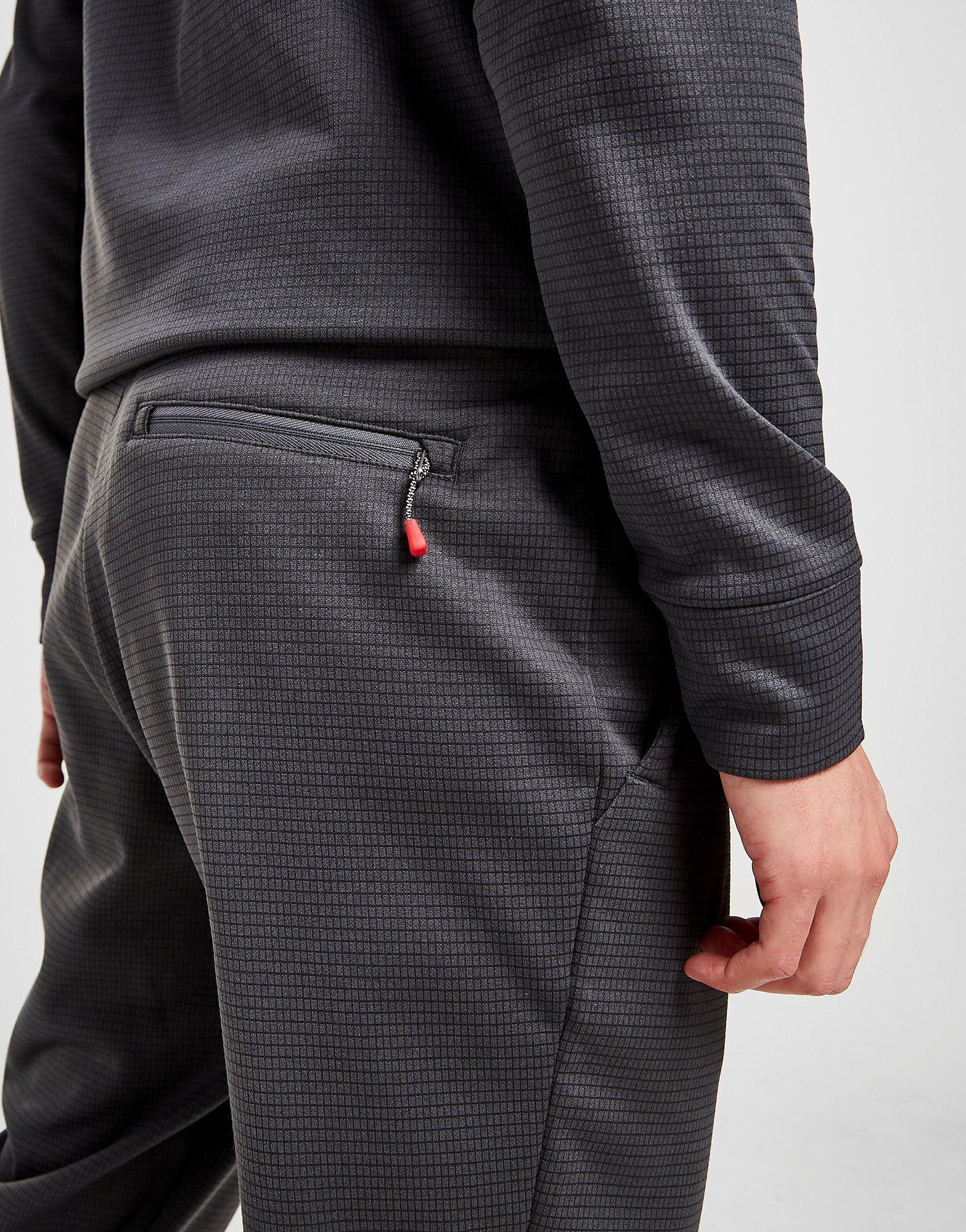 Pantaloni pentru bărbați THE NORTH FACE PANTALONI  TRAIN N LOGO TRACK PANTS NF0A5IJM0C51 Gri