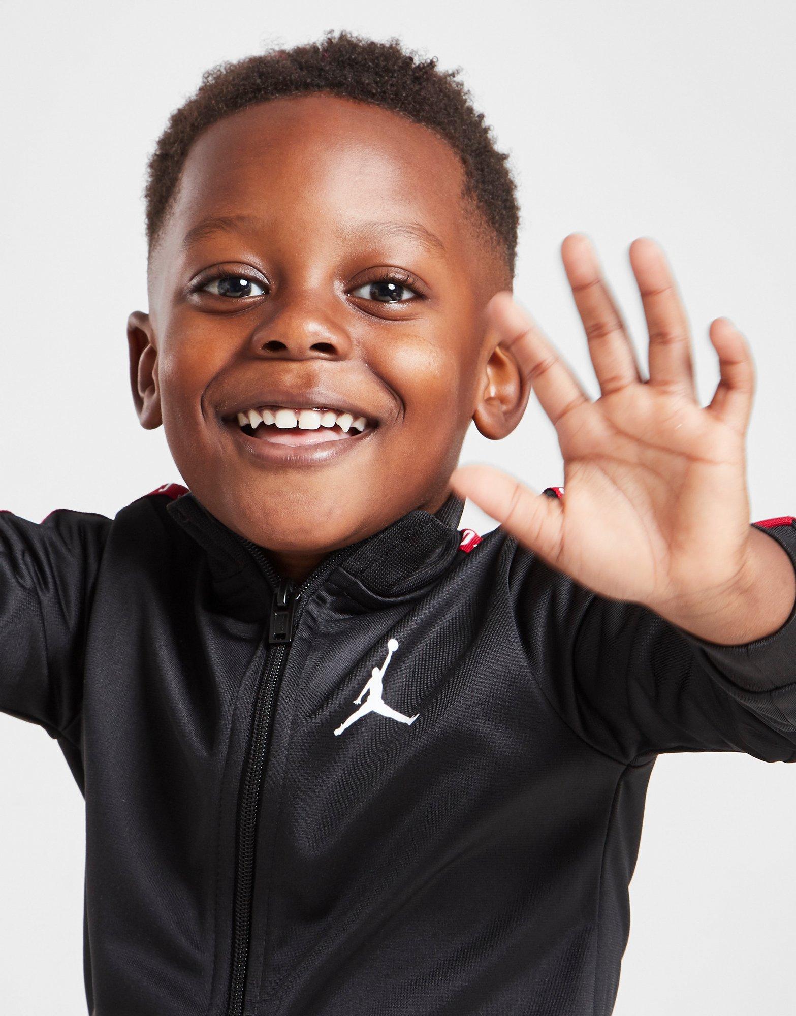 Dětská tepláková souprava JORDAN SOUPRAVA TPE PLY FZ ST BLK/RED 65A449-023 Černá