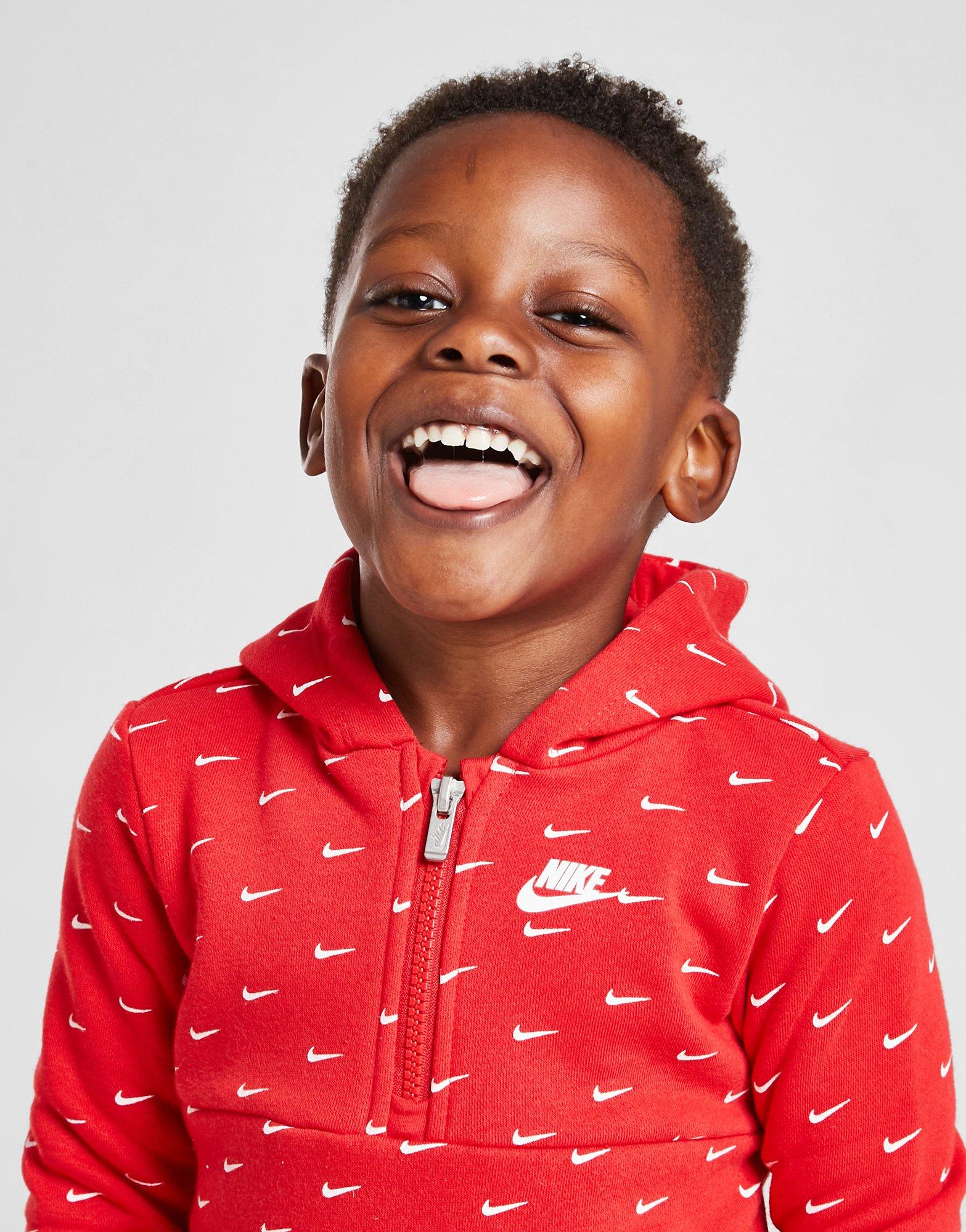 Komplet dresowy dziecięcy JORDAN DRES ALL OVER PRINT SWOOSH 1/4 ZIP 56I456U10 Czerwony