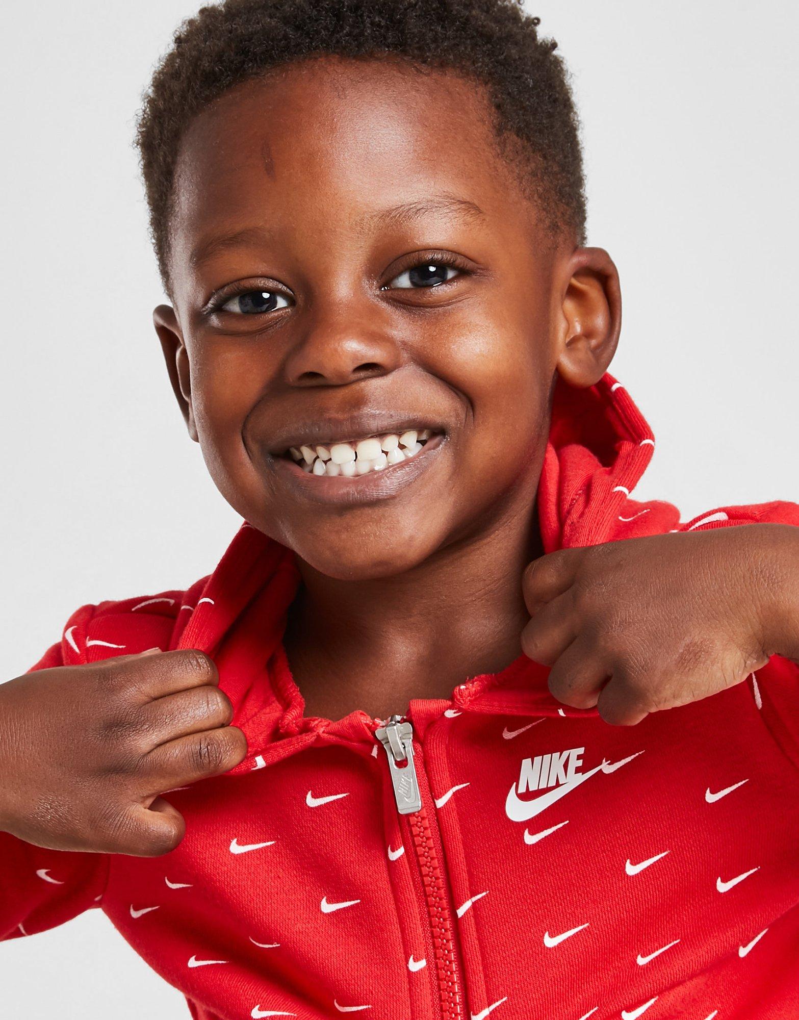 Komplet dresowy dziecięcy JORDAN DRES ALL OVER PRINT SWOOSH 1/4 ZIP 56I456U10 Czerwony