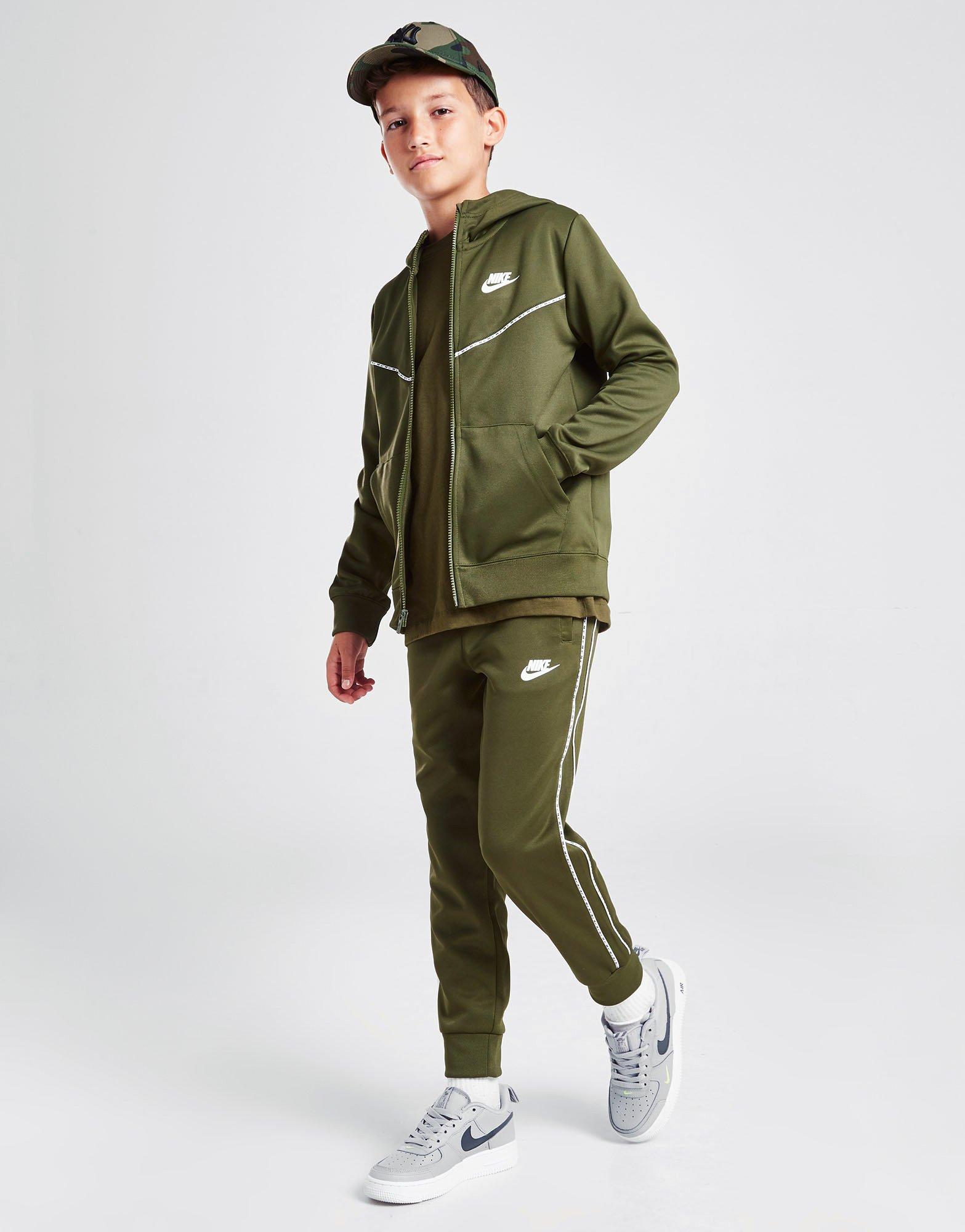 NIKE SPODNIE TAPE POLY TRACK PANTS JUNIOR DD4008326 Zielony