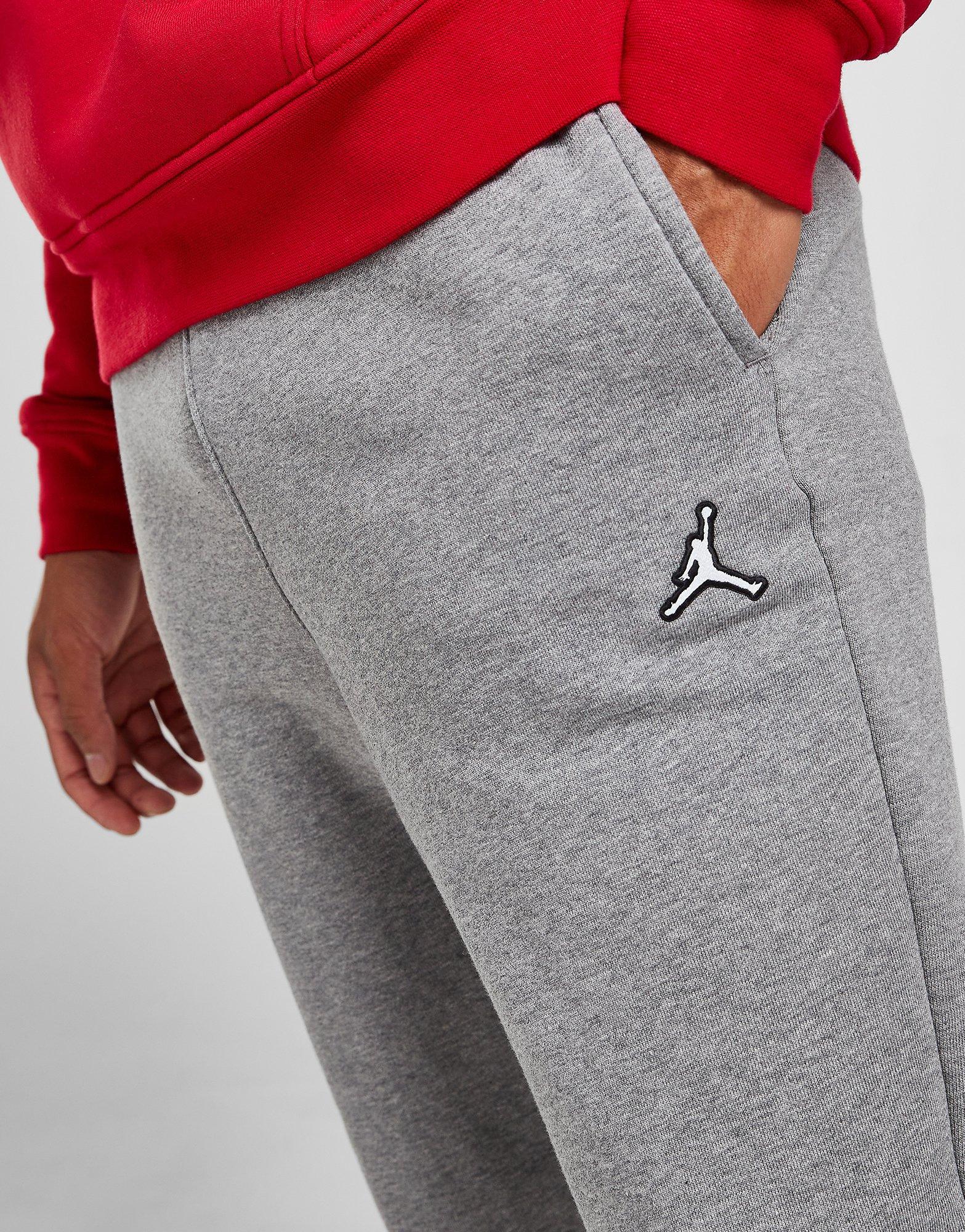 JORDAN NADRÁG ESSENTIAL FLEECE JOGGERS DA9820-091 Szürke
