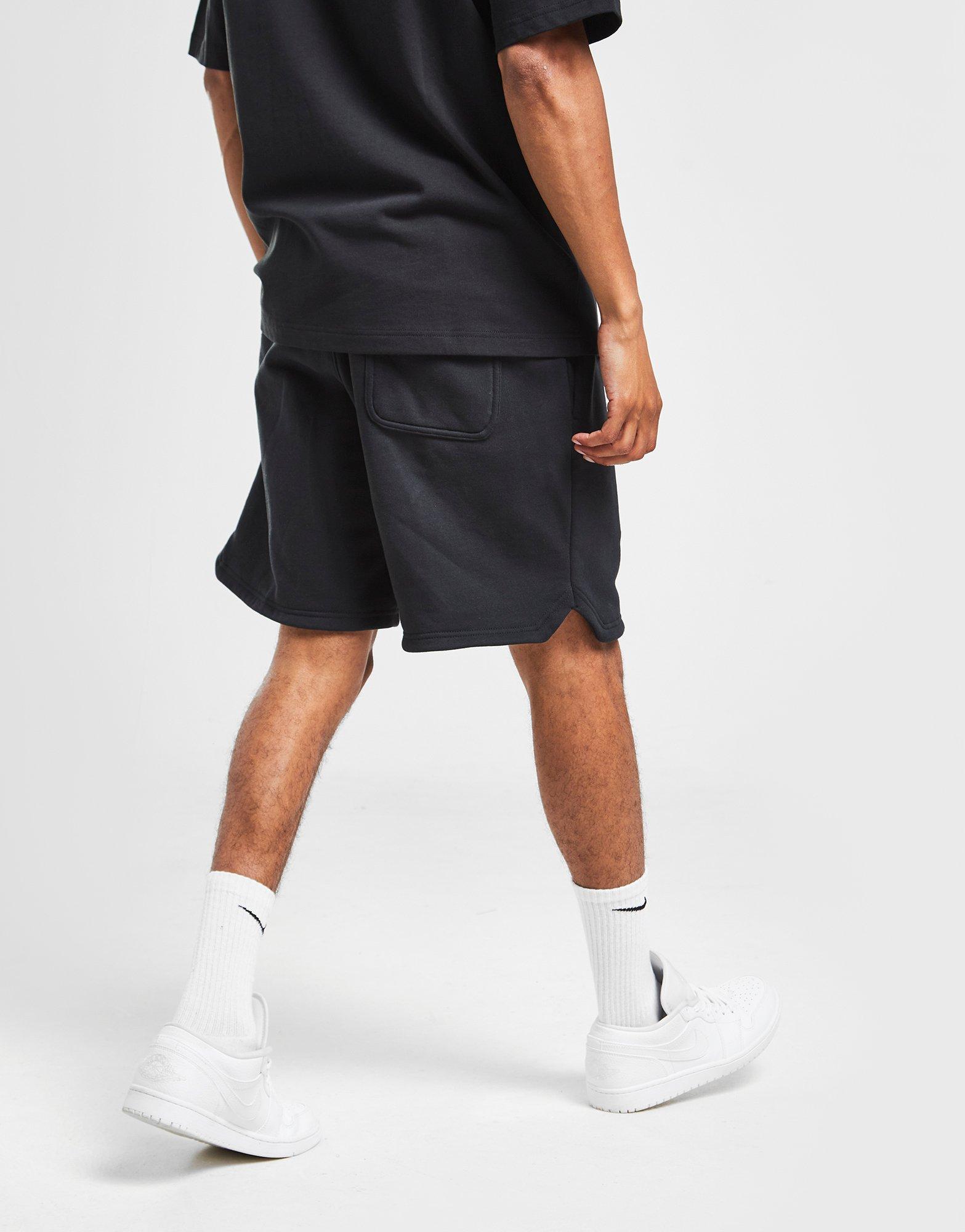 Férfi rövidnadrág JORDAN RÖVIDNADRÁG ESSENTIAL FLEECE SHORTS DA9826-010 Fekete