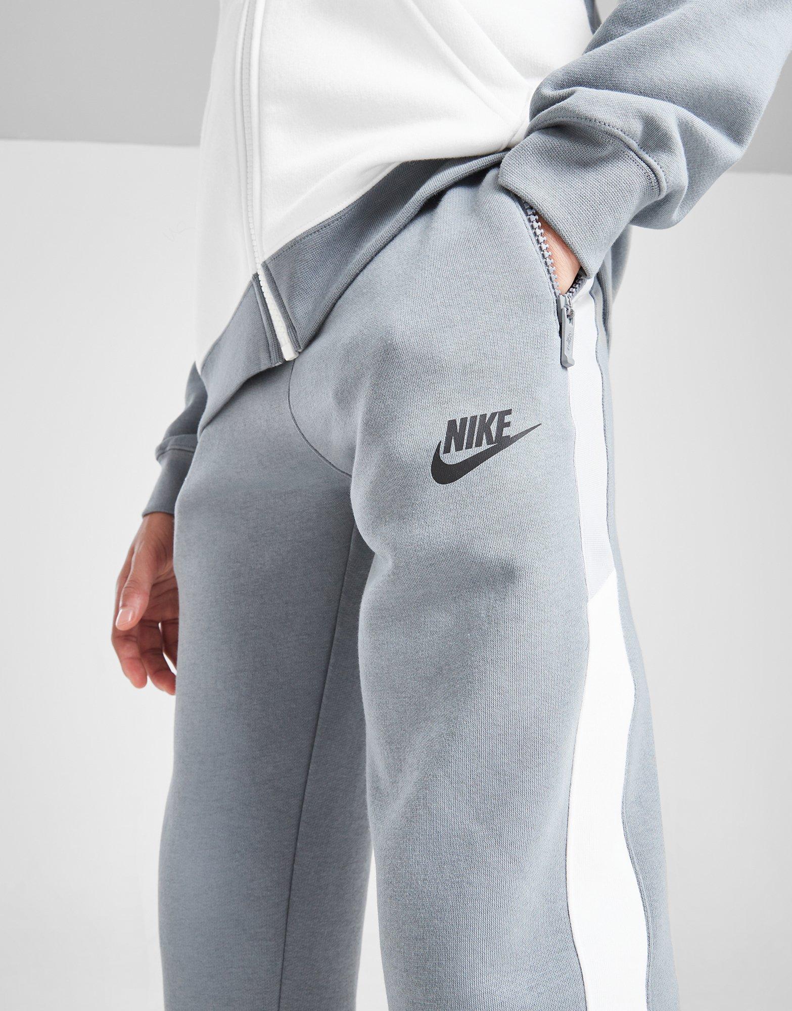 Detské nohavice NIKE NOHAVICE  B NSW HYBRID FLC PANT BB B DM6789-065 Sivá