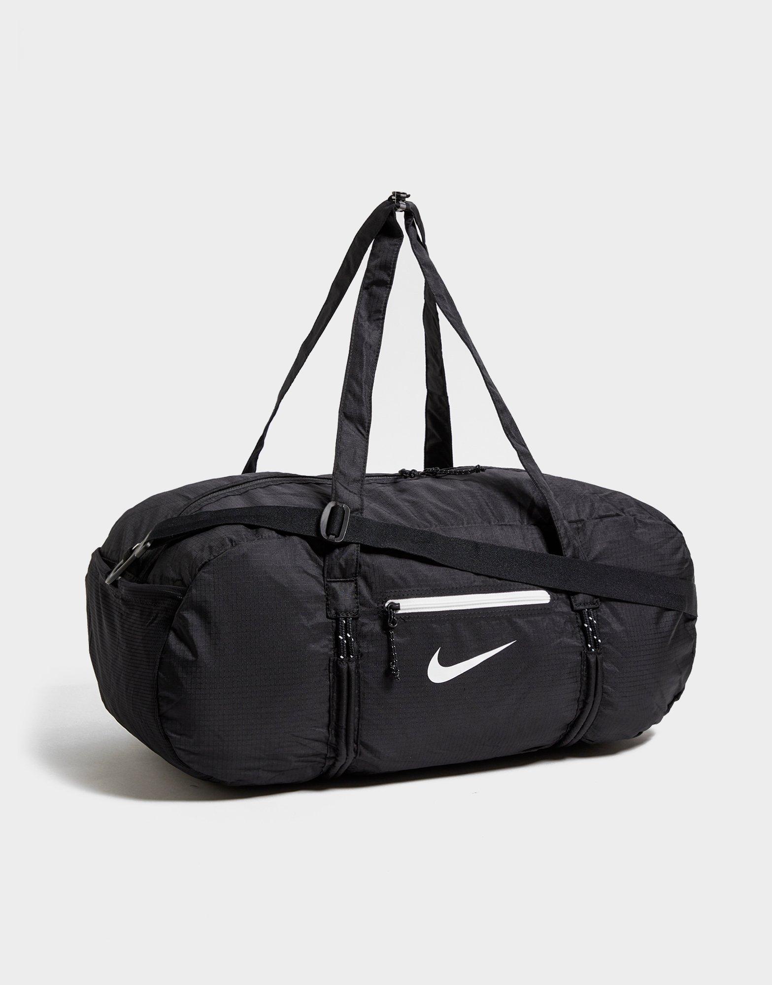 Moteriškas sportinis krepšys NIKE KREPŠYS STASH DUFFEL BAG DB0306-010 Juoda