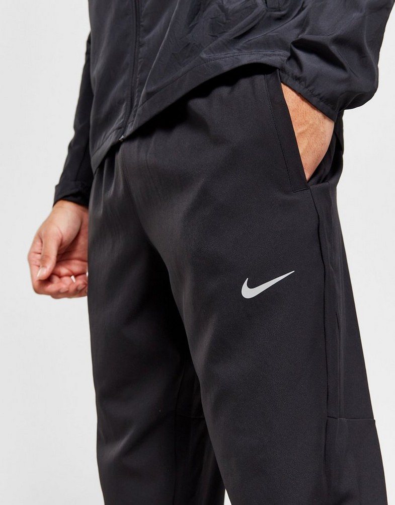 NIKE CHALLENGER WOVEN TRACK PANTS  DD4894-010 Czarny