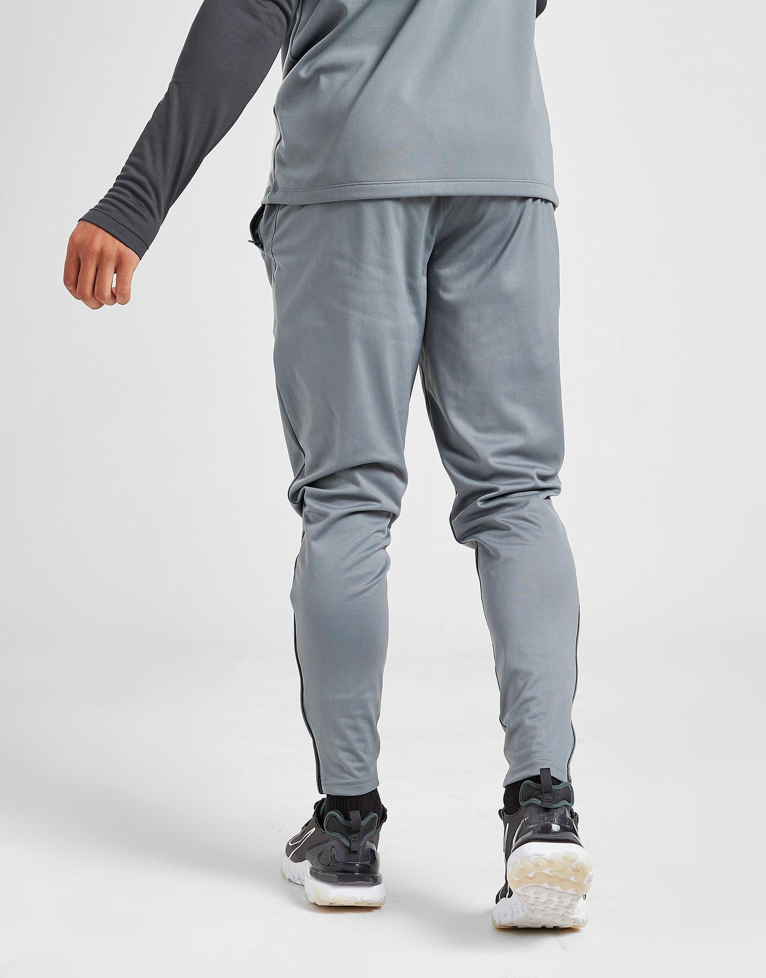 Pantaloni pentru bărbați NIKE PANTALONI  NEXT GEN ACADEMY TRACK PANTS BV6920086 Gri