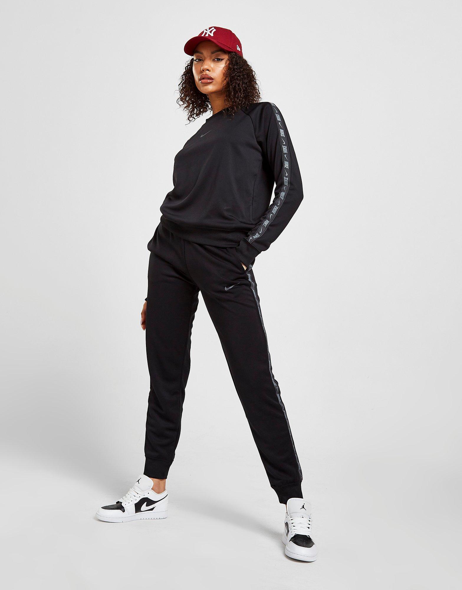 NIKE SPODNIE POLY KNIT TAPE JOGGERS DM4645010 Czarny