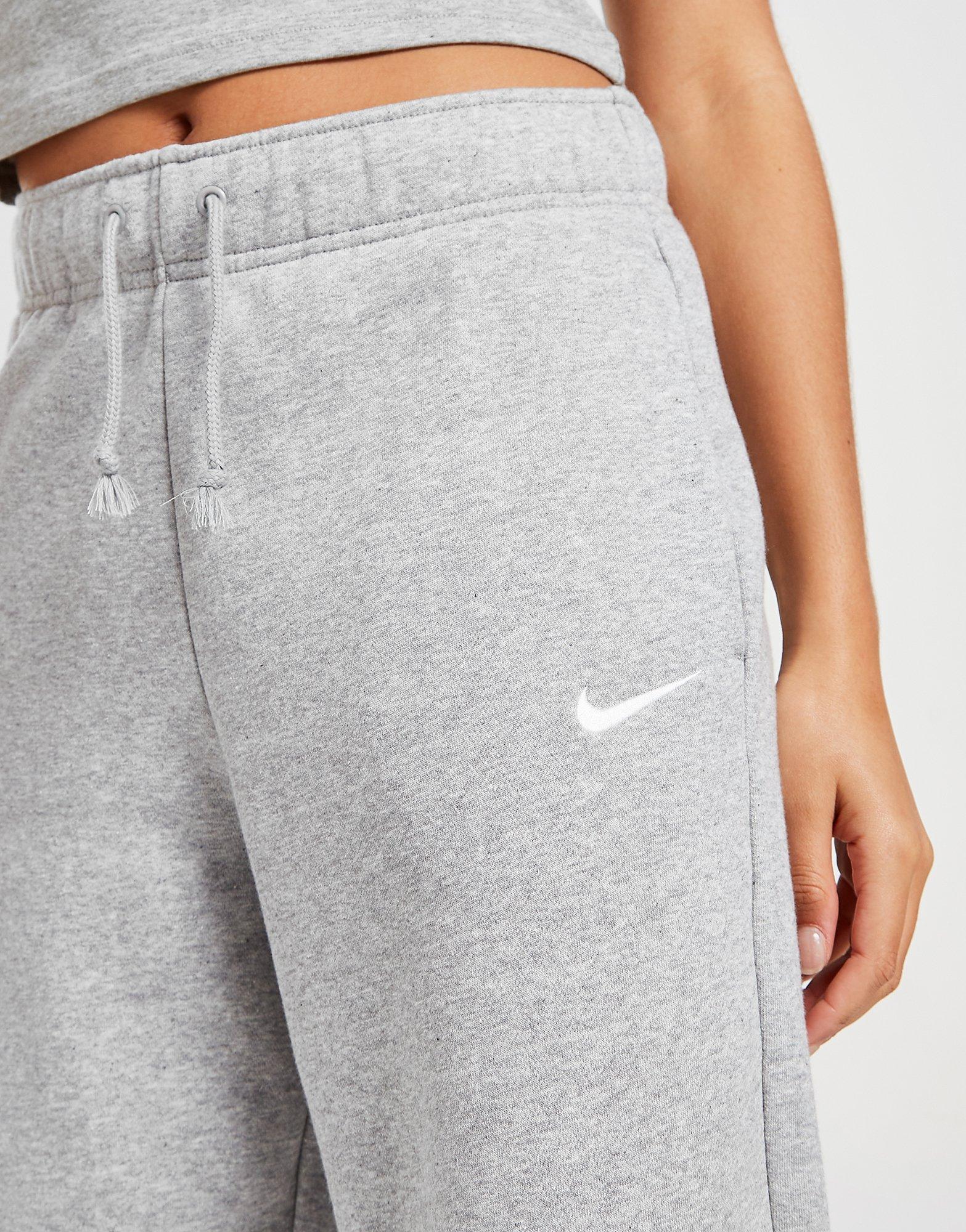 Dámske nohavice NIKE NOHAVICE  W NSW ESSNTL CLCTN FLC CRV PNT DD5636-063 Sivá