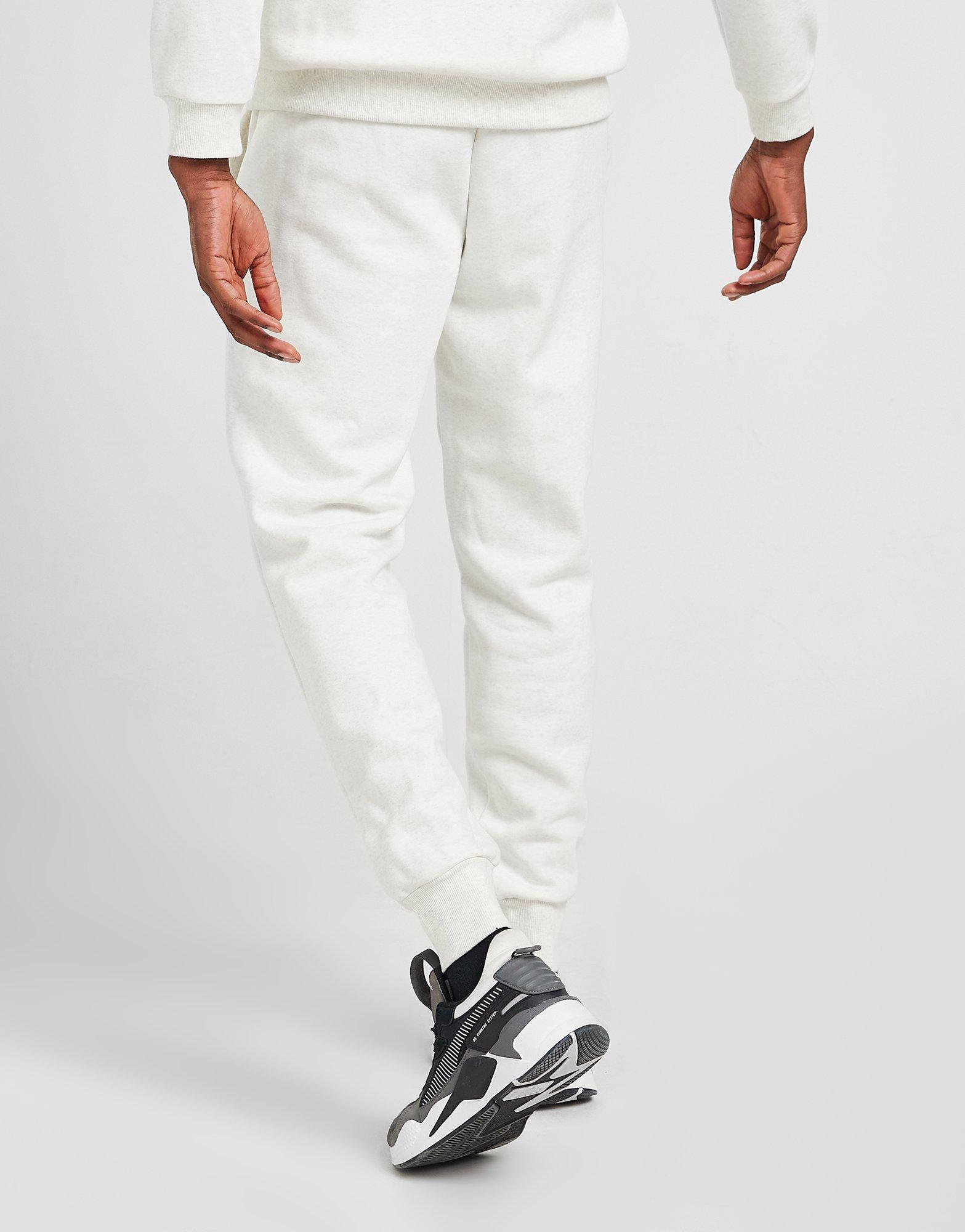 PUMA SPODNIE CORE FLEECE JOGGERS 58671595 Biały