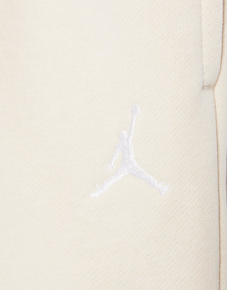 Pantaloni pentru copii JORDAN PANTALONI  WJ BRKN FLC PANT 45F138-XAE Bej