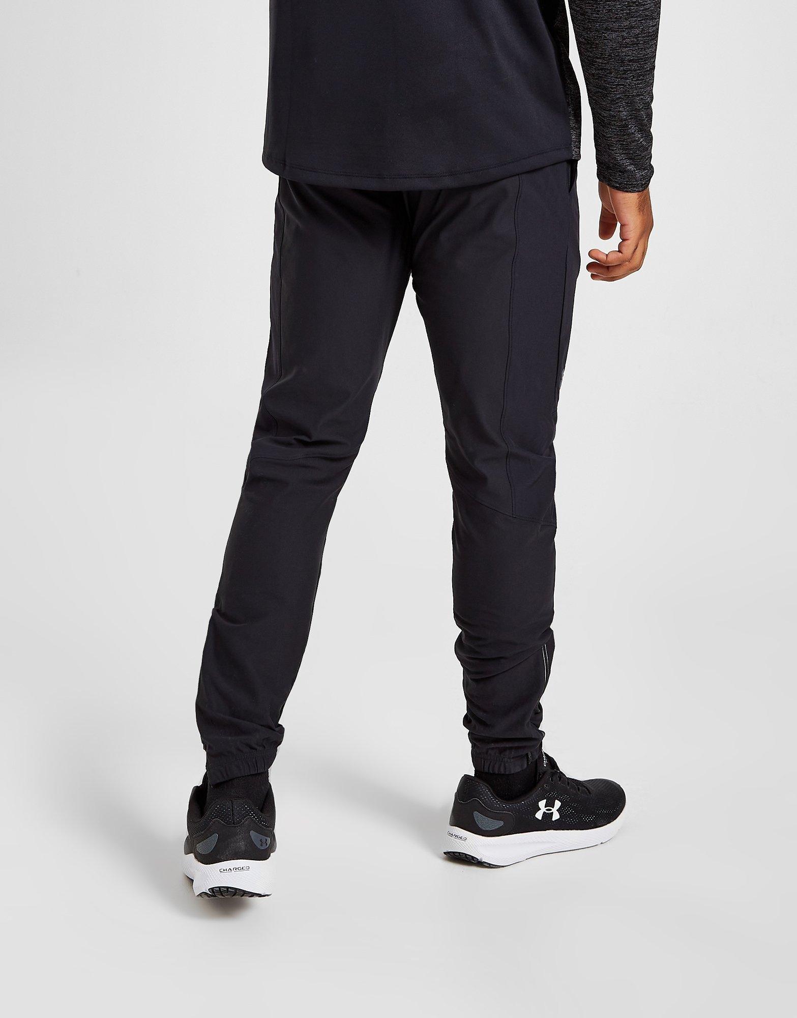 Pánske nohavice UNDER ARMOUR NOHAVICE  VANISH TRACK PANTS 1370149-002 Čierna