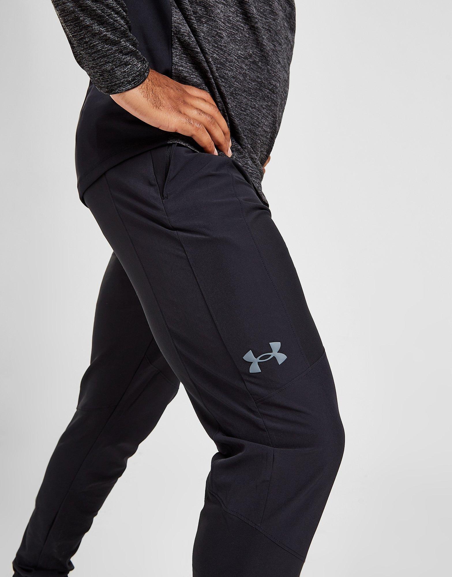 Pánske nohavice UNDER ARMOUR NOHAVICE  VANISH TRACK PANTS 1370149-002 Čierna