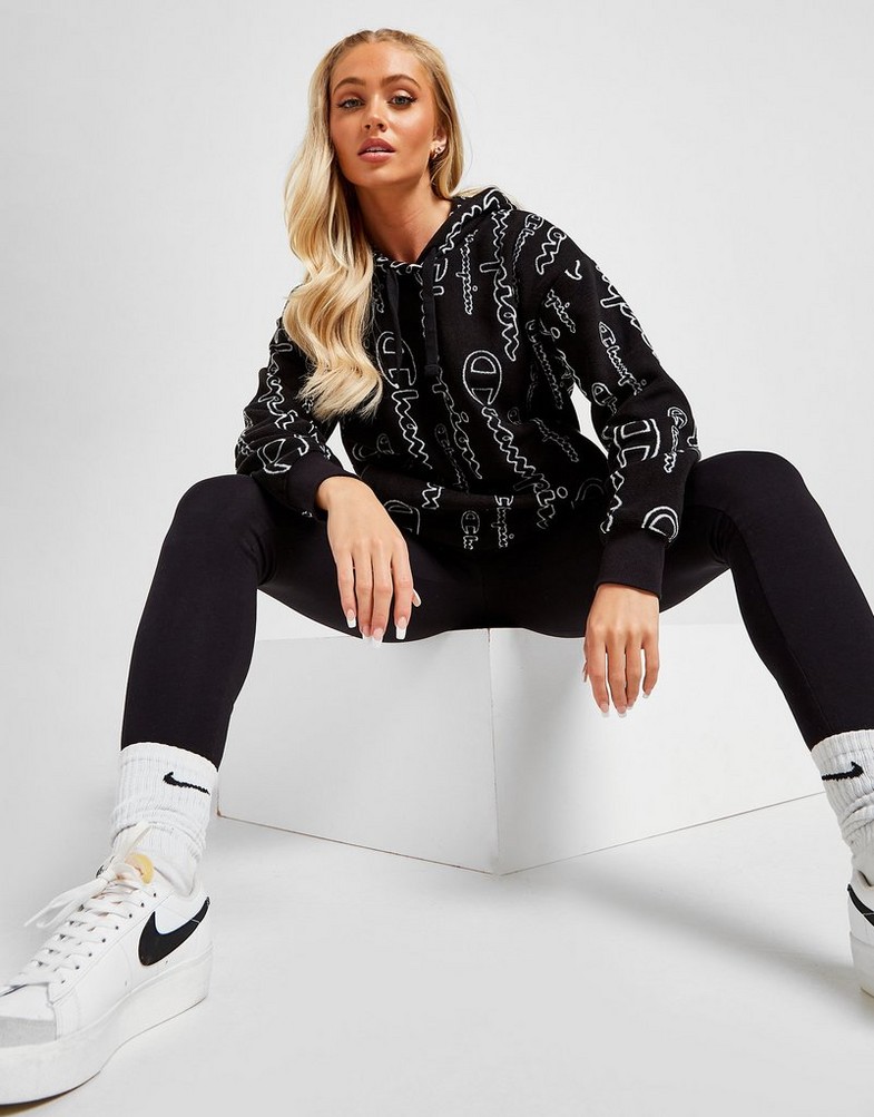 Bluza damska CHAMPION Z KAPTUREM ALL OVER PRINT POLAR FLEECE HOODIE 114498NBKALLOVRKL001 Czarny
