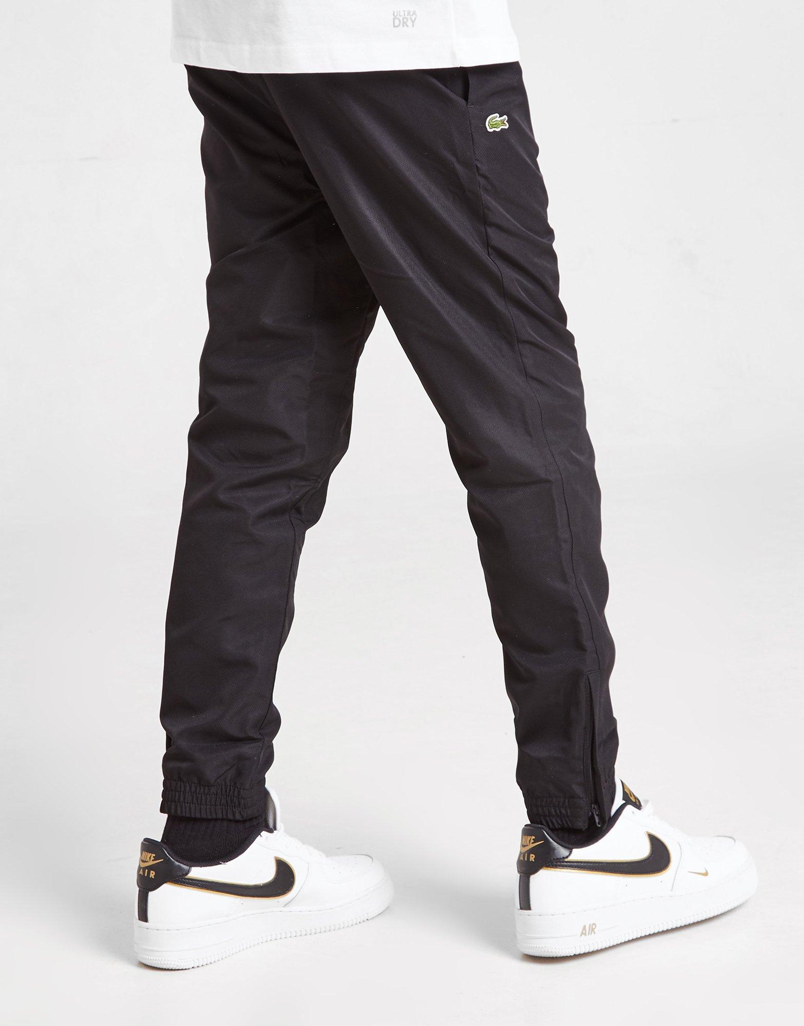 Detské nohavice LACOSTE NOHAVICE  NEW GUPPY PANT BLK XJ9622031 Čierna