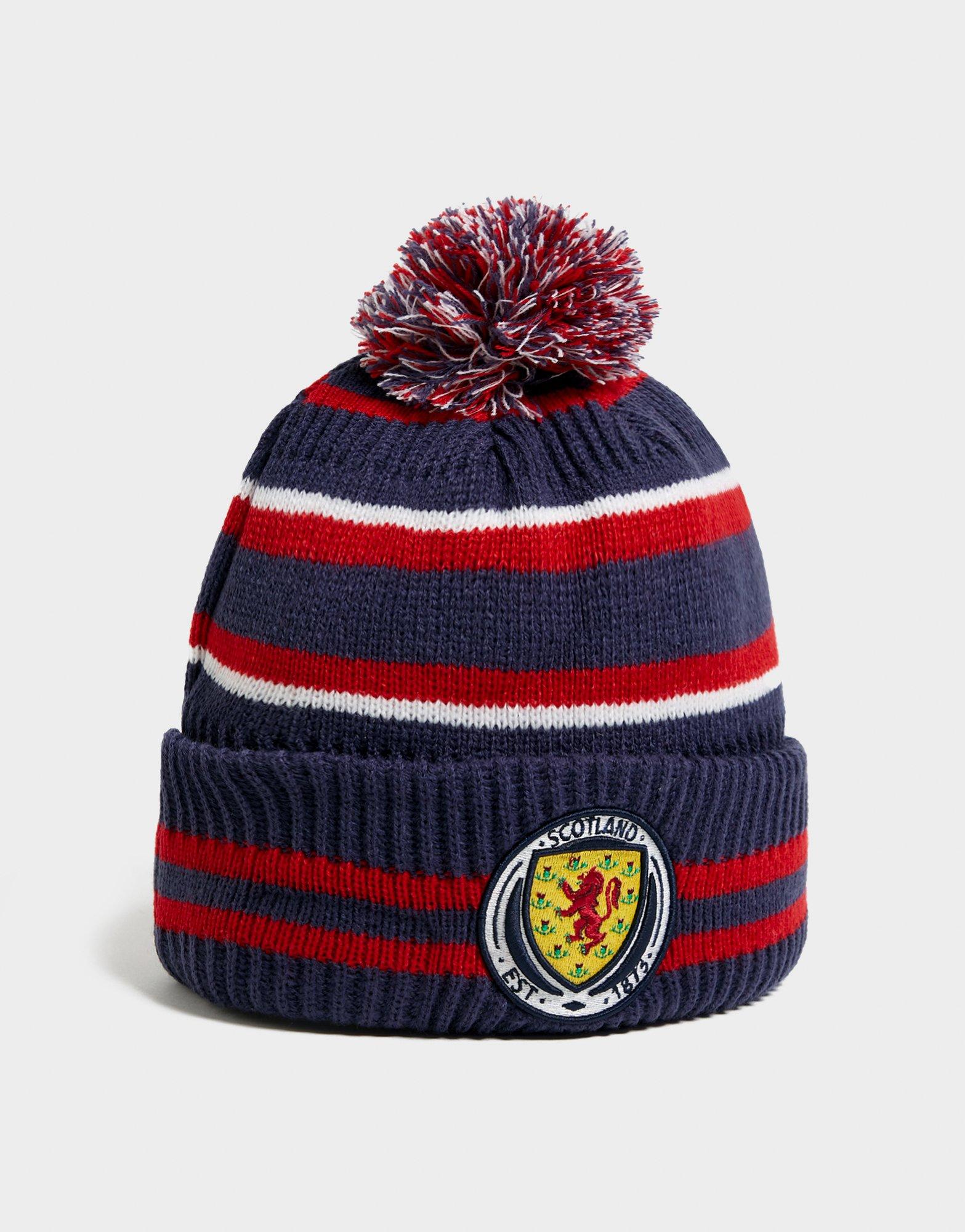 Női téli sapká NEW ERA SAPKA TÉLI SCOTLAND POM STRIPE BEANIE 60183697 Sötétkék
