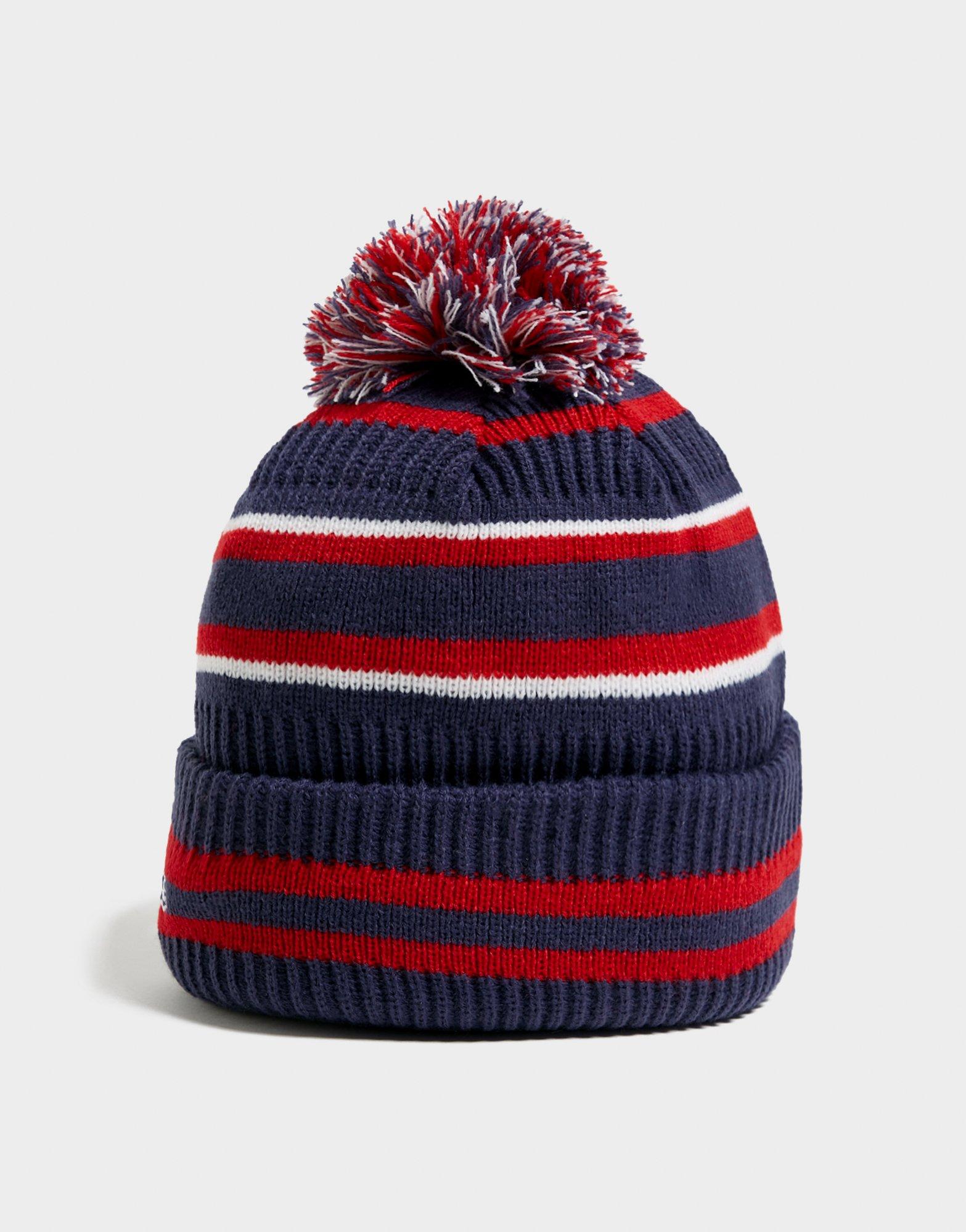 Női téli sapká NEW ERA SAPKA TÉLI SCOTLAND POM STRIPE BEANIE 60183697 Sötétkék
