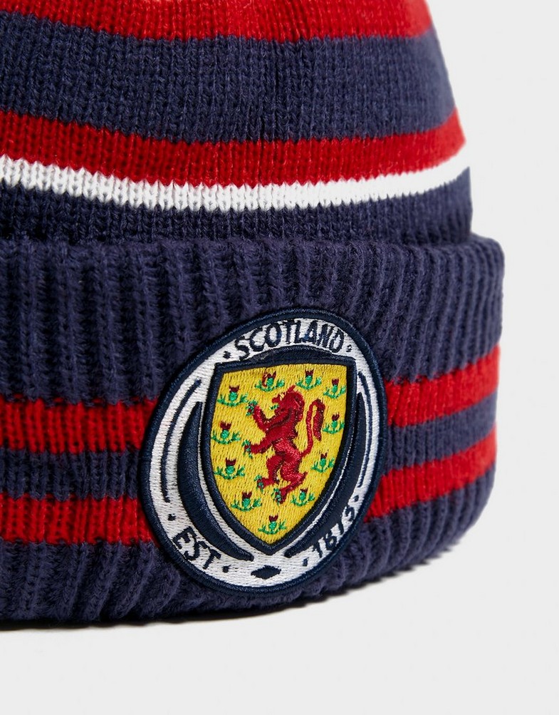 Dámska zimná čiapka NEW ERA ČIAPKA ZIMNÁ SCOTLAND POM STRIPE BEANIE 60183697 Tmavomodrá