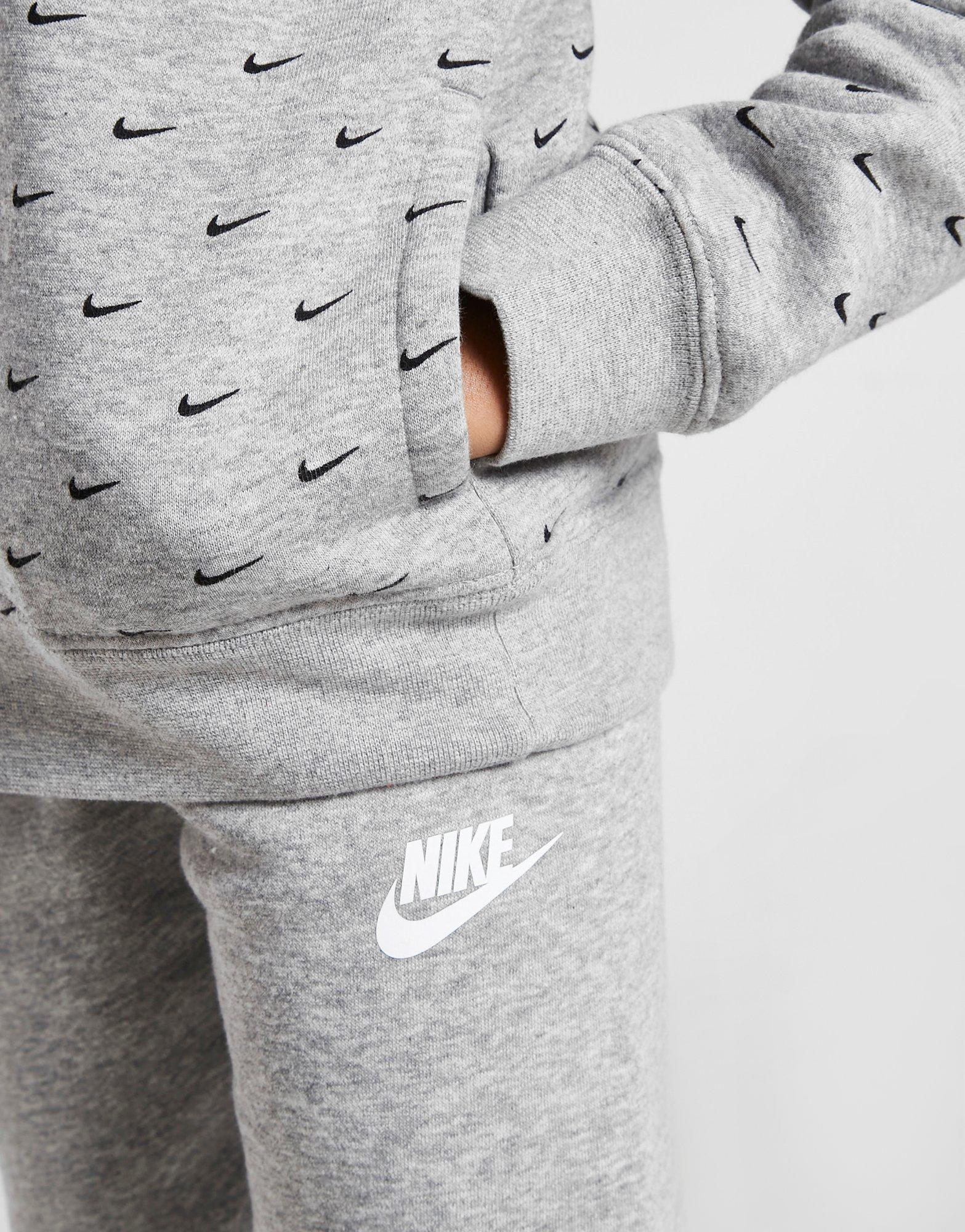 Komplet dresowy dziecięcy NIKE DRES ALL OVER PRINT SWOOSH 1/4 ZIP TRACKSU 86J122042 Czarny